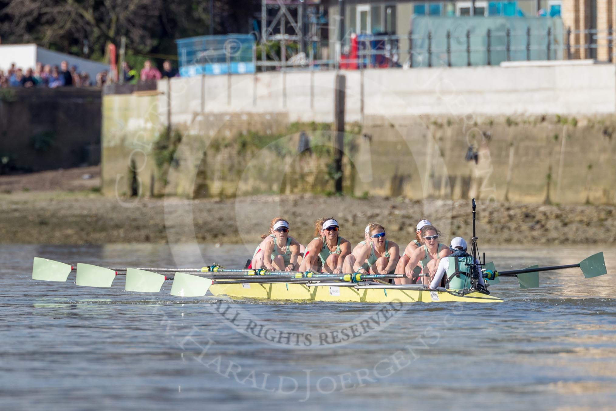 The Boat Race season 2017 -  The Cancer Research Women's Boat Race: Cambridge is keeping their comfortable lead at Fulham Reach - bow Ashton Brown, 2 Imogen Grant, 3 Claire Lambe, 4 Anna Dawson, 5 Holly Hill, 6 Alice White, 7 Myriam Goudet, stroke Melissa Wilson, cox Matthew Holland.
River Thames between Putney Bridge and Mortlake,
London SW15,

United Kingdom,
on 02 April 2017 at 16:41, image #153