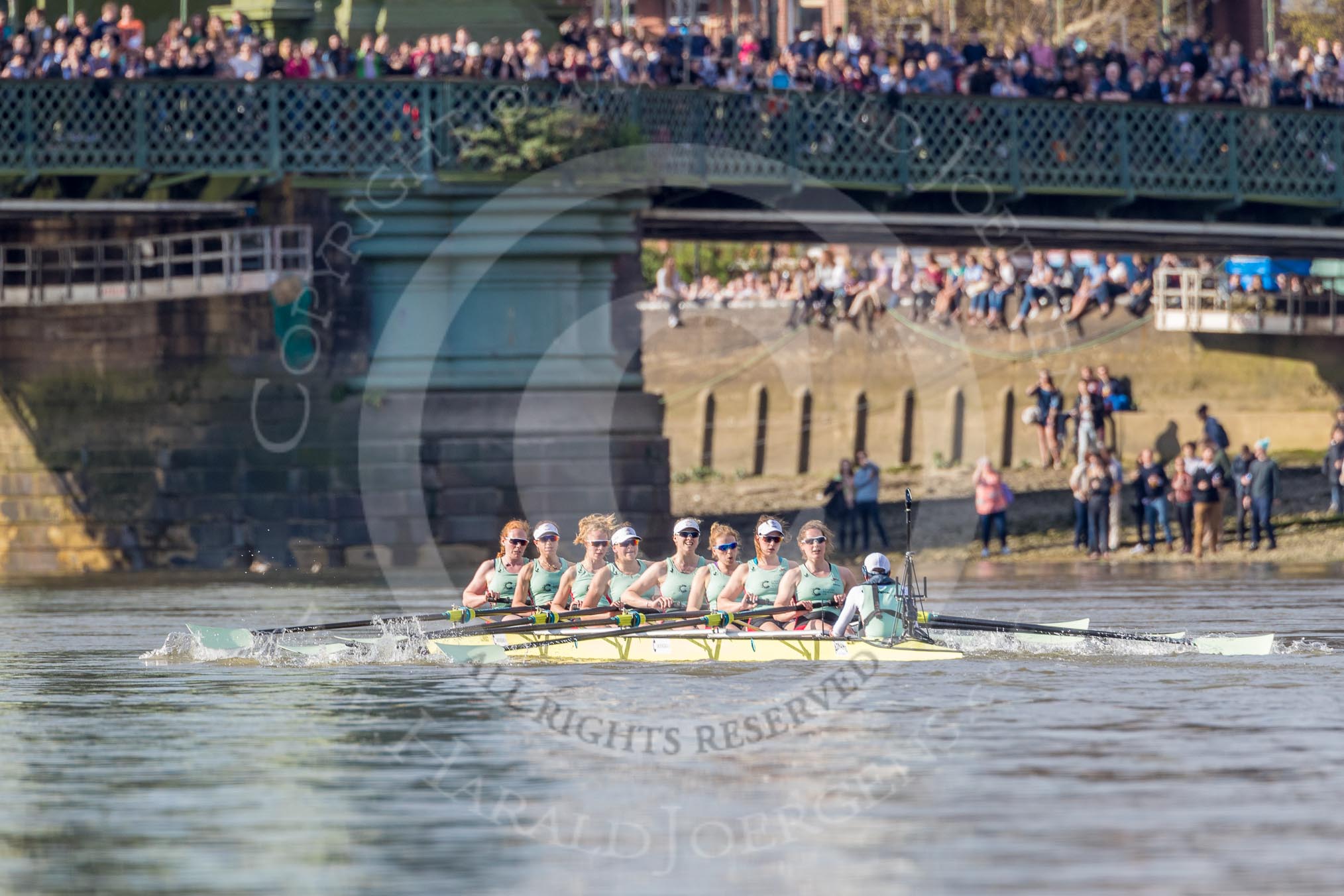 The Boat Race season 2017 -  The Cancer Research Women's Boat Race: Cambridge is keeping their comfortable lead at Hammersmith Bridge - bow Ashton Brown, 2 Imogen Grant, 3 Claire Lambe, 4 Anna Dawson, 5 Holly Hill, 6 Alice White, 7 Myriam Goudet, stroke Melissa Wilson, cox Matthew Holland.
River Thames between Putney Bridge and Mortlake,
London SW15,

United Kingdom,
on 02 April 2017 at 16:41, image #155