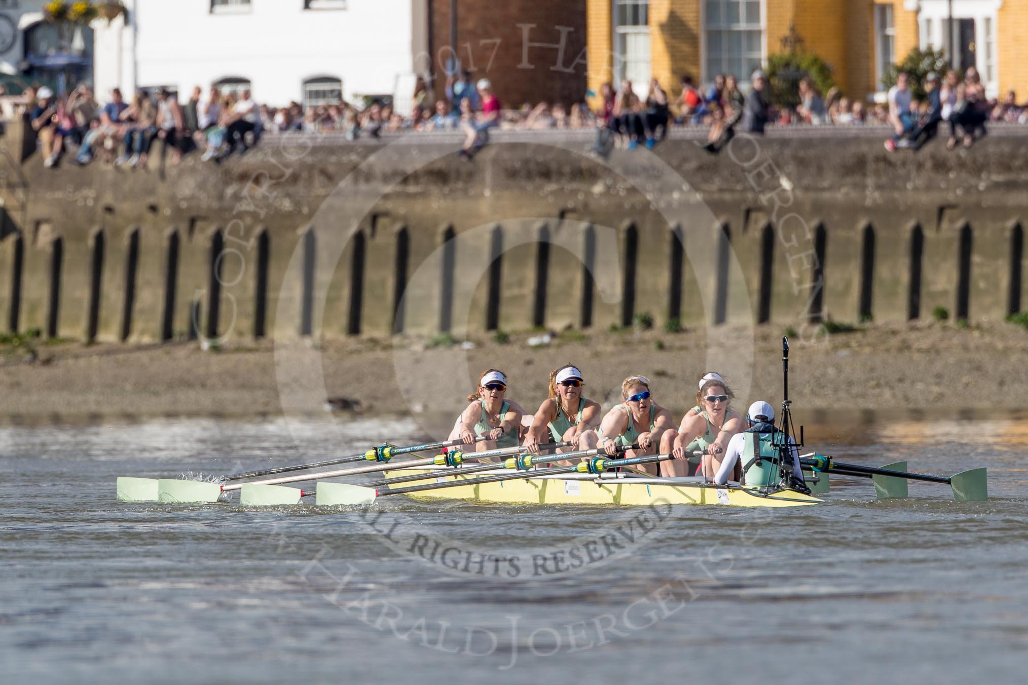 The Boat Race season 2017 -  The Cancer Research Women's Boat Race: Cambridge is keeping their comfortable lead at Hammersmith Bridge - bow Ashton Brown, 2 Imogen Grant, 3 Claire Lambe, 4 Anna Dawson, 5 Holly Hill, 6 Alice White, 7 Myriam Goudet, stroke Melissa Wilson, cox Matthew Holland.
River Thames between Putney Bridge and Mortlake,
London SW15,

United Kingdom,
on 02 April 2017 at 16:42, image #157