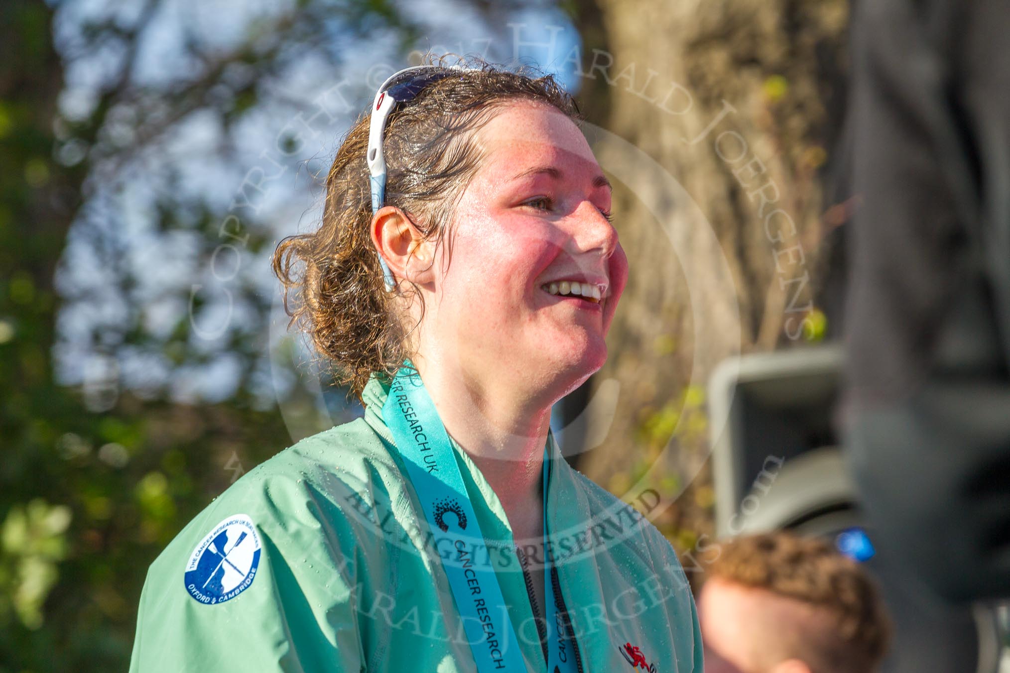 The Boat Race season 2017 -  The Cancer Research Women's Boat Race: CUWBC stroke Melissa Wilson, with lots of Champagne, leaving the price giving.
River Thames between Putney Bridge and Mortlake,
London SW15,

United Kingdom,
on 02 April 2017 at 17:14, image #303