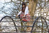 The Boat Race season 2017 -  The Cancer Research Women's Boat Race: Young lady enjoying the sunshine in Bishop's Park.
River Thames between Putney Bridge and Mortlake,
London SW15,

United Kingdom,
on 02 April 2017 at 13:43, image #7