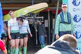 The Boat Race season 2017 -  The Cancer Research Women's Boat Race: The Cambridge crew carrying their boat from the boat house to the river, on the left CUWBC stroke Melissa Wilson.
River Thames between Putney Bridge and Mortlake,
London SW15,

United Kingdom,
on 02 April 2017 at 15:47, image #49