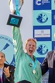 The Boat Race season 2017 -  The Cancer Research Women's Boat Race: A jubilant Ashton Brown with the Women's Boat Race trophy at the price giving.
River Thames between Putney Bridge and Mortlake,
London SW15,

United Kingdom,
on 02 April 2017 at 17:11, image #235