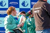 The Boat Race season 2017 -  The Cancer Research Women's Boat Race: CUWBC president Ashton Brown with the Women's Boat Race trophy at the price giving, on her right Imogen Grant enjoying Champagne.
River Thames between Putney Bridge and Mortlake,
London SW15,

United Kingdom,
on 02 April 2017 at 17:13, image #279