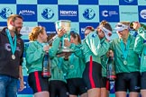 The Boat Race season 2017 -  The Cancer Research Women's Boat Race: CUWBC after the Chanpange spraying at the price giving, with the Women's Boat Race trophy. On the left head coach Rob Barker.
River Thames between Putney Bridge and Mortlake,
London SW15,

United Kingdom,
on 02 April 2017 at 17:13, image #288