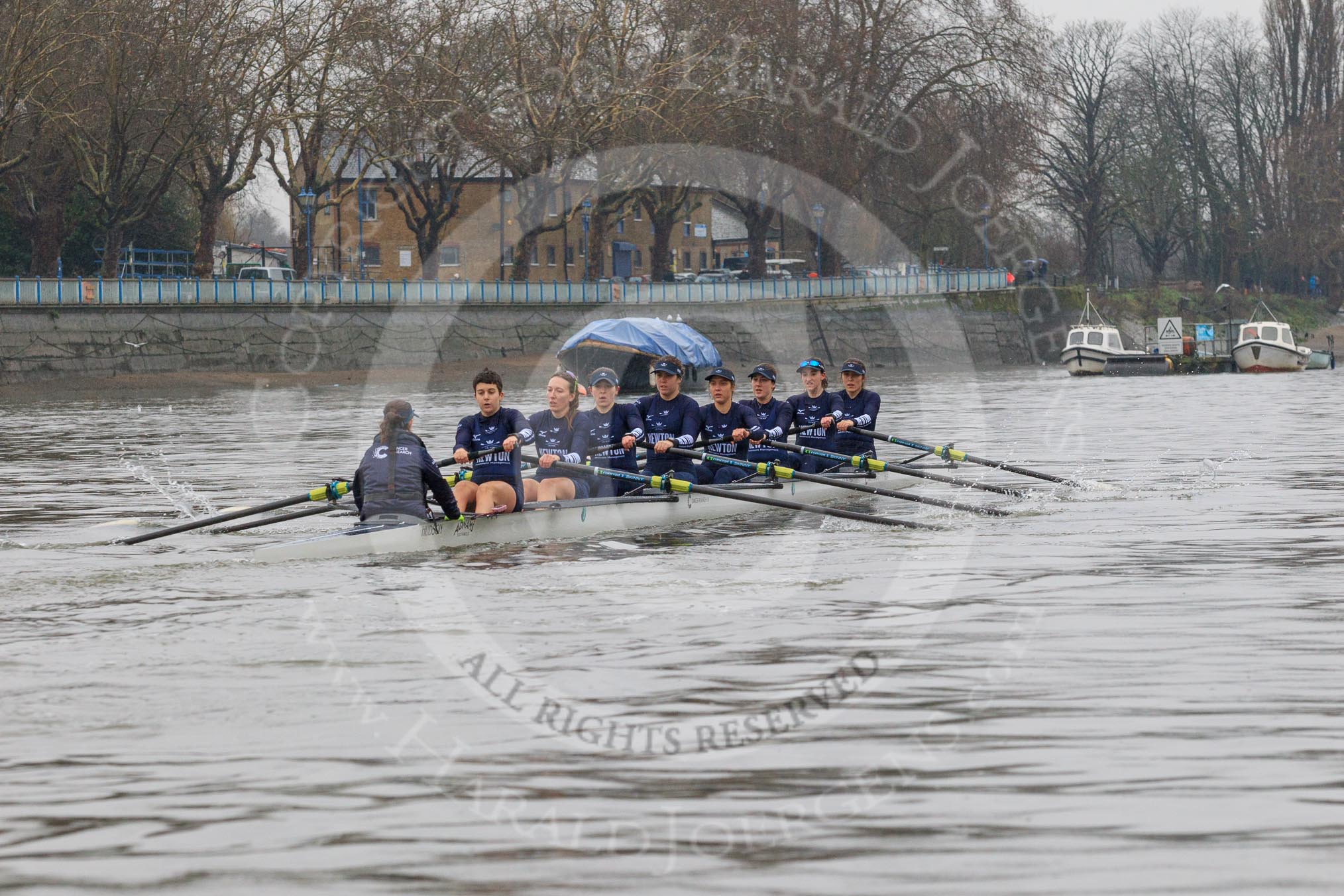 The Boat Race season 2018 - Women's Boat Race Trial Eights (OUWBC, Oxford): "Great Typhoon" passing the boat houses on Putney Embankment - cox Jessica Buck, stroke Alice Roberts,  7 Abigail Killen, 6 Sara Kushma, 5 Olivia Pryer, 4 Linda Van Bijsterveldt, 3 Madeline Goss, 2 Laura Depner, bow Matilda Edwards.
River Thames between Putney Bridge and Mortlake,
London SW15,

United Kingdom,
on 21 January 2018 at 14:28, image #67