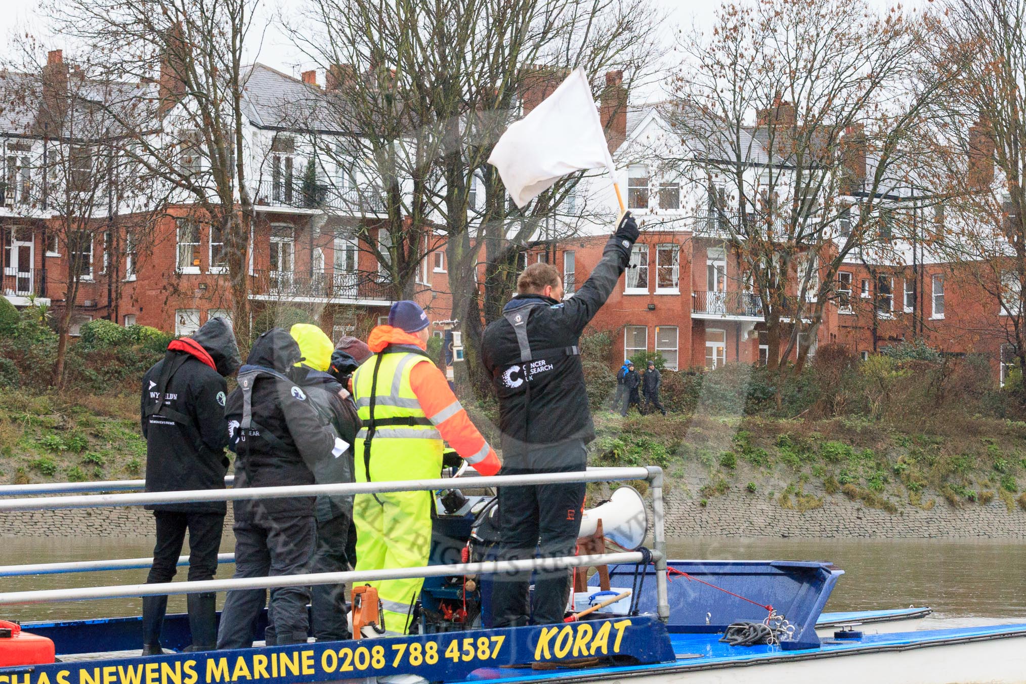 The Boat Race season 2018 - Women's Boat Race Trial Eights (OUWBC, Oxford): Race umpire Sir Matthew Pinsent warning the crews as they are getting too close.
River Thames between Putney Bridge and Mortlake,
London SW15,

United Kingdom,
on 21 January 2018 at 14:34, image #94