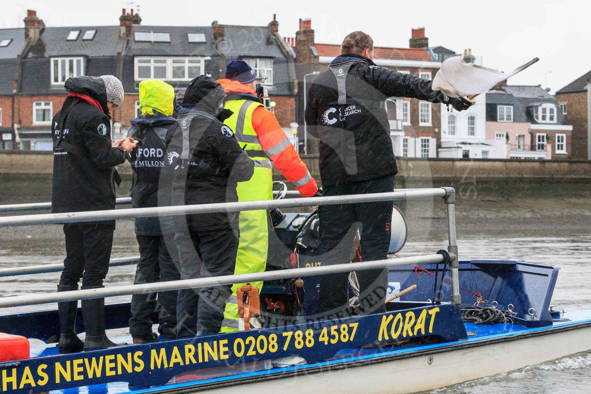 The Boat Race season 2018 - Women's Boat Race Trial Eights (OUWBC, Oxford): Race umpire Sir Matthew Pinsent warning the crews as they get a bit close again.
River Thames between Putney Bridge and Mortlake,
London SW15,

United Kingdom,
on 21 January 2018 at 14:43, image #154