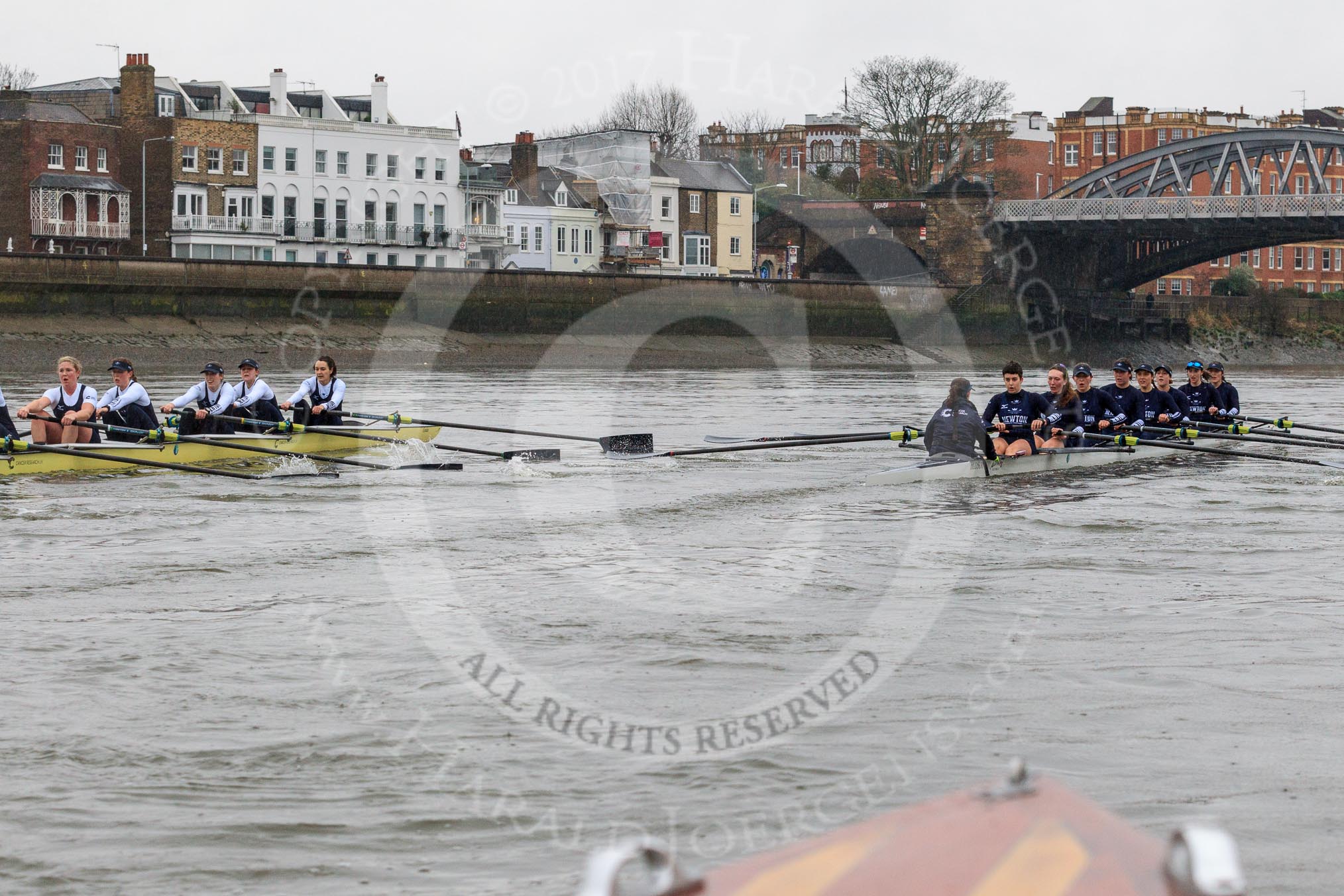 The Boat Race season 2018 - Women's Boat Race Trial Eights (OUWBC, Oxford): "Great Typhoon" and "Coursing River" approaching Barnes Railway Bridge.
River Thames between Putney Bridge and Mortlake,
London SW15,

United Kingdom,
on 21 January 2018 at 14:43, image #155