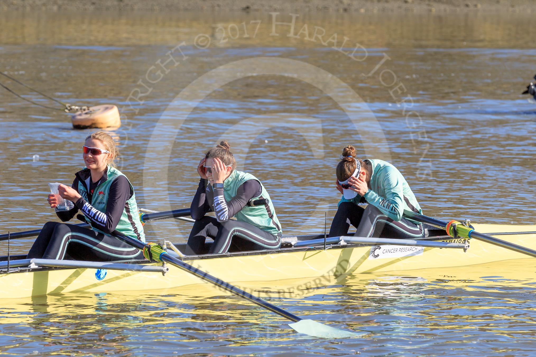 The Women's Boat Race season 2018 - fixture CUWBC vs. ULBC: CUWBC getting ready - 3 Alice White, 2 Myriam Goudet-Boukhatmi, bow Olivia Coffey.
River Thames between Putney Bridge and Mortlake,
London SW15,

United Kingdom,
on 17 February 2018 at 12:32, image #11