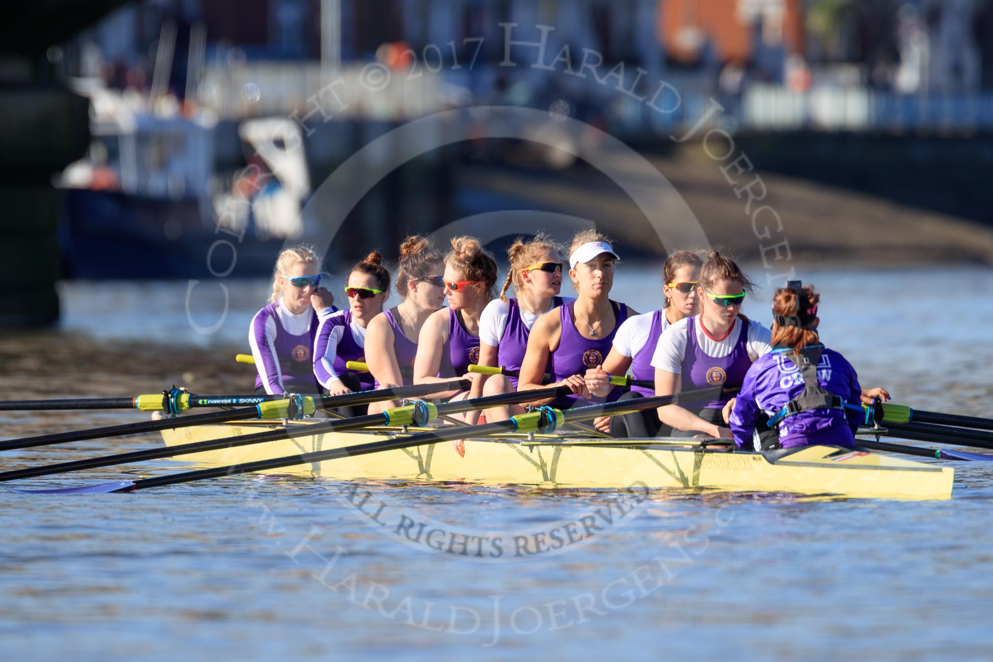 The Women's Boat Race season 2018 - fixture CUWBC vs. ULBC: ULBC at Putney Bridge, getting ready for the race - bow Ally French, 2 Robyn Hart-Winks, 3 Fionnuala Gannon, 4 Katherine Barnhill, 5 Hannah Roberts, 6 Oonagh Cousins, 7 Jordan Cole-Huissan, stroke Issy Powel, cox Lauren Holland.
River Thames between Putney Bridge and Mortlake,
London SW15,

United Kingdom,
on 17 February 2018 at 13:08, image #34