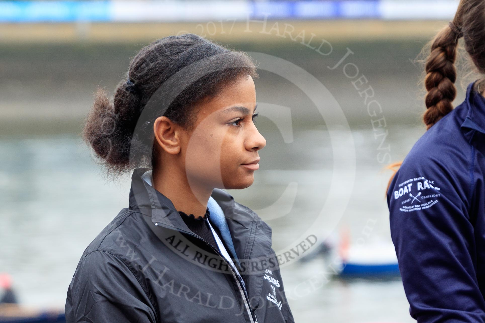 The Cancer Research UK Women's Boat Race 2018: Zahara Alacia, a 15 years old member of the Boat Race Future Blues Programme, about to through the coin at the toss.
River Thames between Putney Bridge and Mortlake,
London SW15,

United Kingdom,
on 24 March 2018 at 14:40, image #39