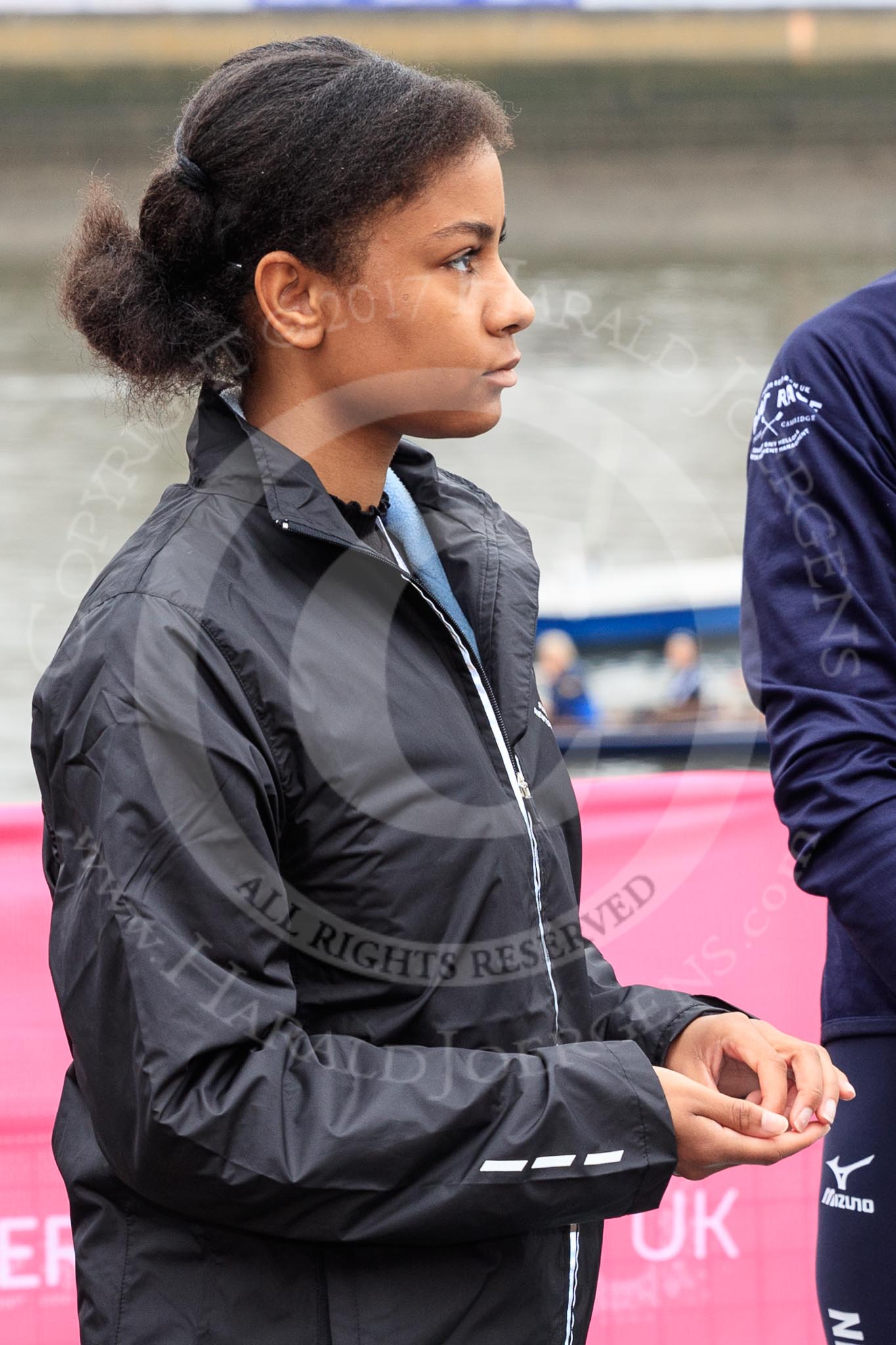 The Cancer Research UK Women's Boat Race 2018: Zahara Alacia, a 15 years old member of the Boat Race Future Blues Programme, about to through the coin at the toss.
River Thames between Putney Bridge and Mortlake,
London SW15,

United Kingdom,
on 24 March 2018 at 14:40, image #43