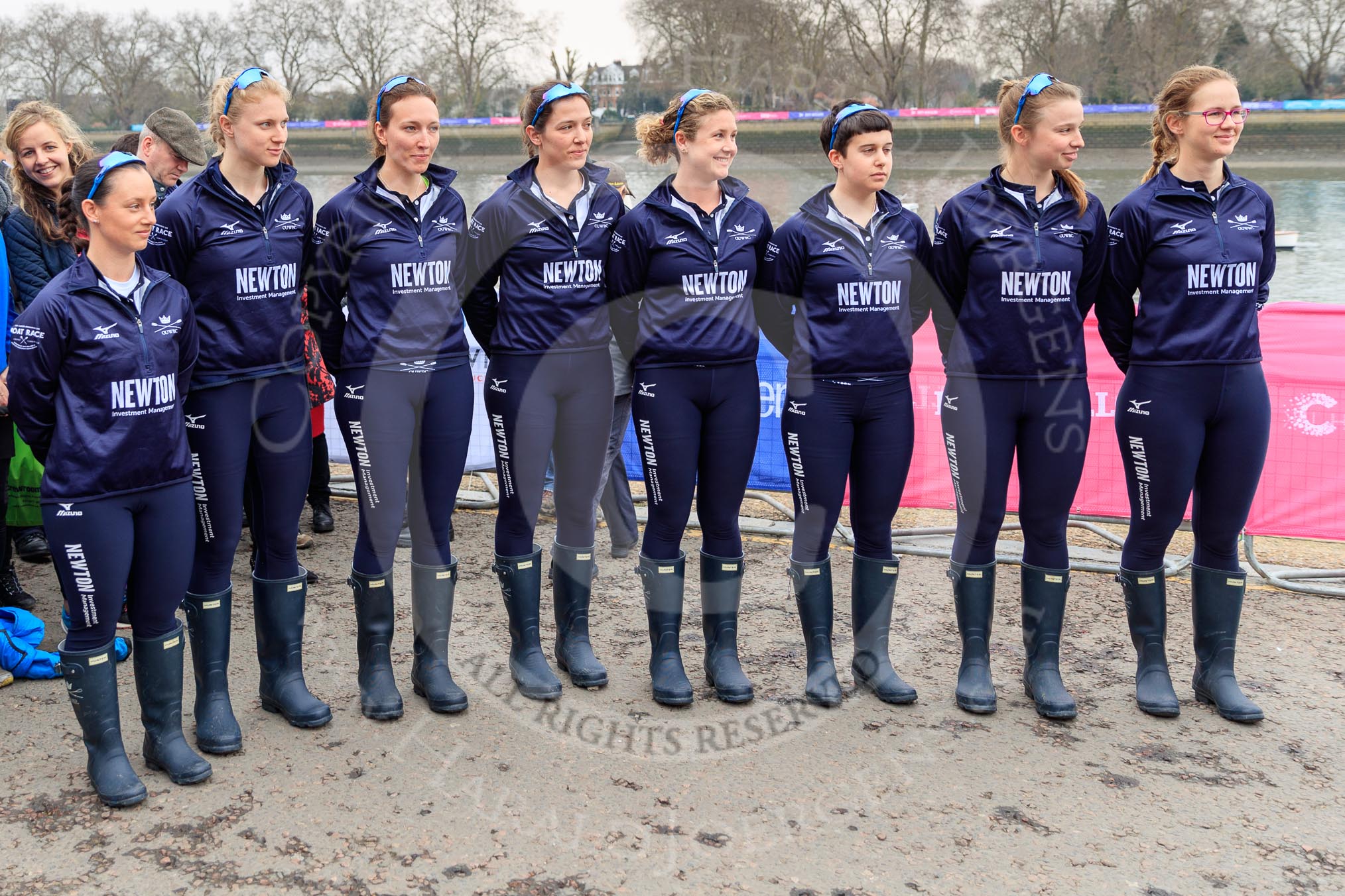 The Cancer Research UK Women's Boat Race 2018: The Oxford Blue Boat crew after the toss - cox Jessica Buck, stroke Beth Bridgman, 7 Abigail Killen, 6	Sara Kushma, 5 Morgan McGovern, 4 Alice Roberts, 3 Juliette Perry, bow Renée Koolschijn.
River Thames between Putney Bridge and Mortlake,
London SW15,

United Kingdom,
on 24 March 2018 at 14:41, image #51