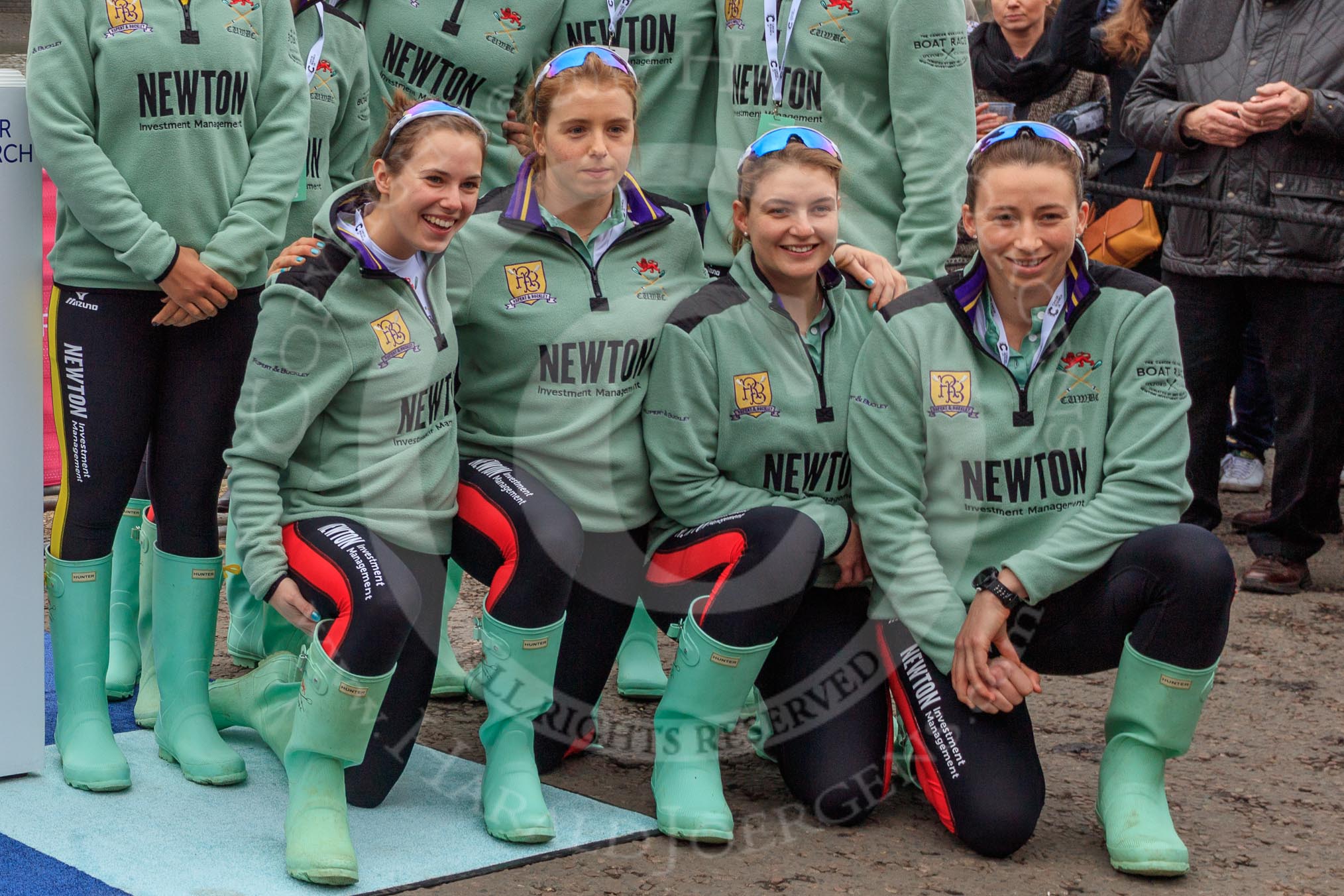 The Cancer Research UK Women's Boat Race 2018: The Cambridge crew  at the toss, here cox Sophie Shapter, 6 Alice White, 7 Myriam Goudet-Boukhatmi, and stroke Olivia Coffey.
River Thames between Putney Bridge and Mortlake,
London SW15,

United Kingdom,
on 24 March 2018 at 14:42, image #55