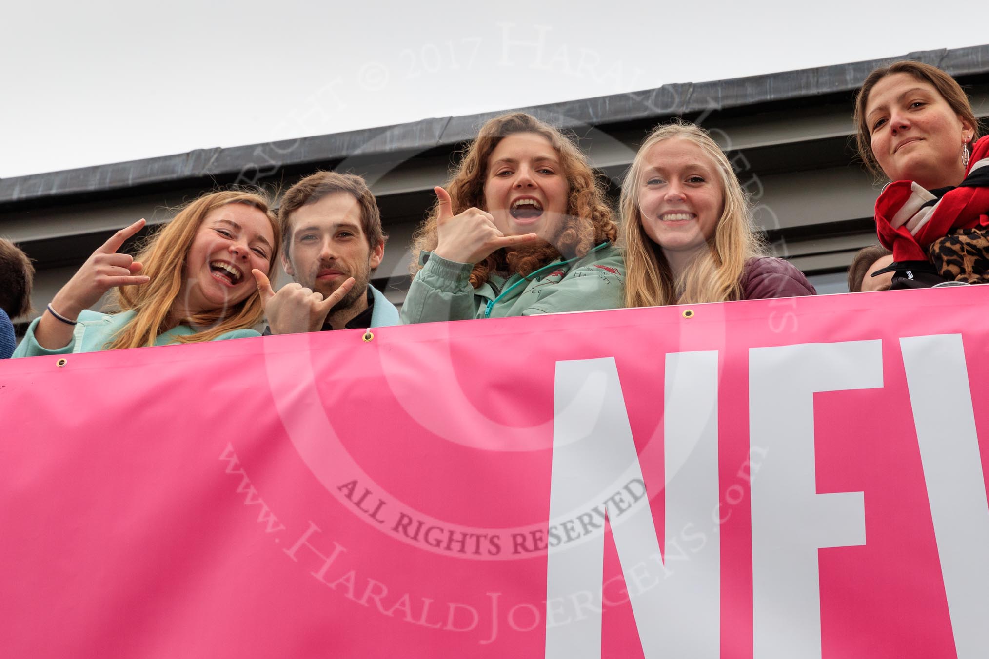 The Cancer Research UK Women's Boat Race 2018: Spectators on the balcony of the Thames RC boathouse.
River Thames between Putney Bridge and Mortlake,
London SW15,

United Kingdom,
on 24 March 2018 at 14:46, image #60