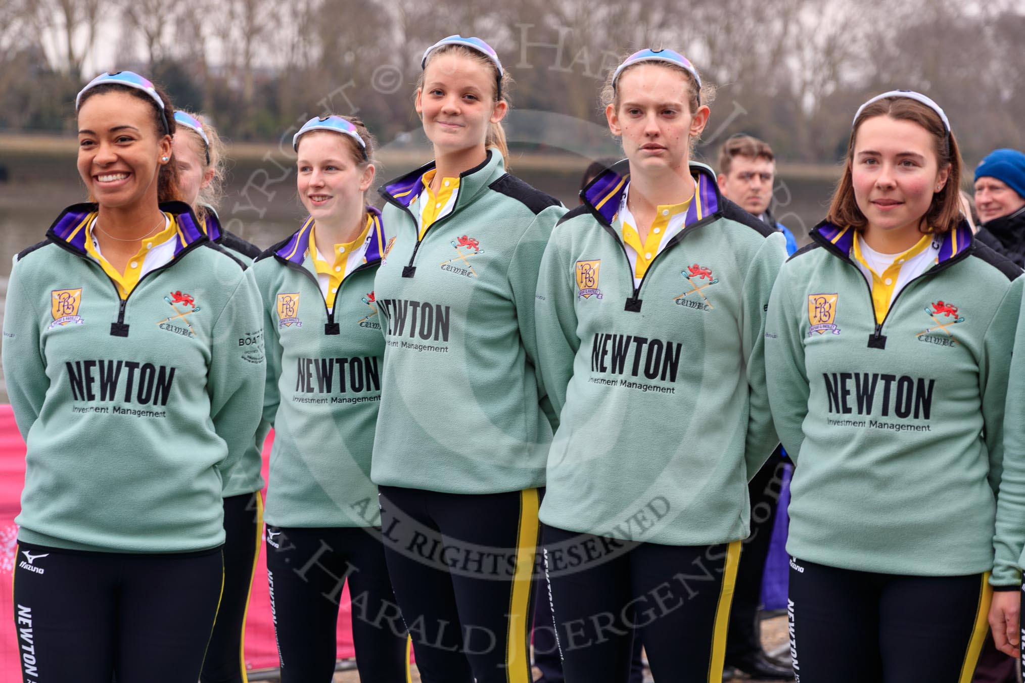 The Cancer Research UK Women's Boat Race 2018: The reserve boat toss - here, for Cambridge's Blondie, CUWBC president Daphne Martschenko, behind her bow seat Pippa Dakin, then 2 Emma Andrews,  3 Anne Beenken,  4 Laura Foster,  and 6 Larkin Sayre.
River Thames between Putney Bridge and Mortlake,
London SW15,

United Kingdom,
on 24 March 2018 at 14:54, image #67