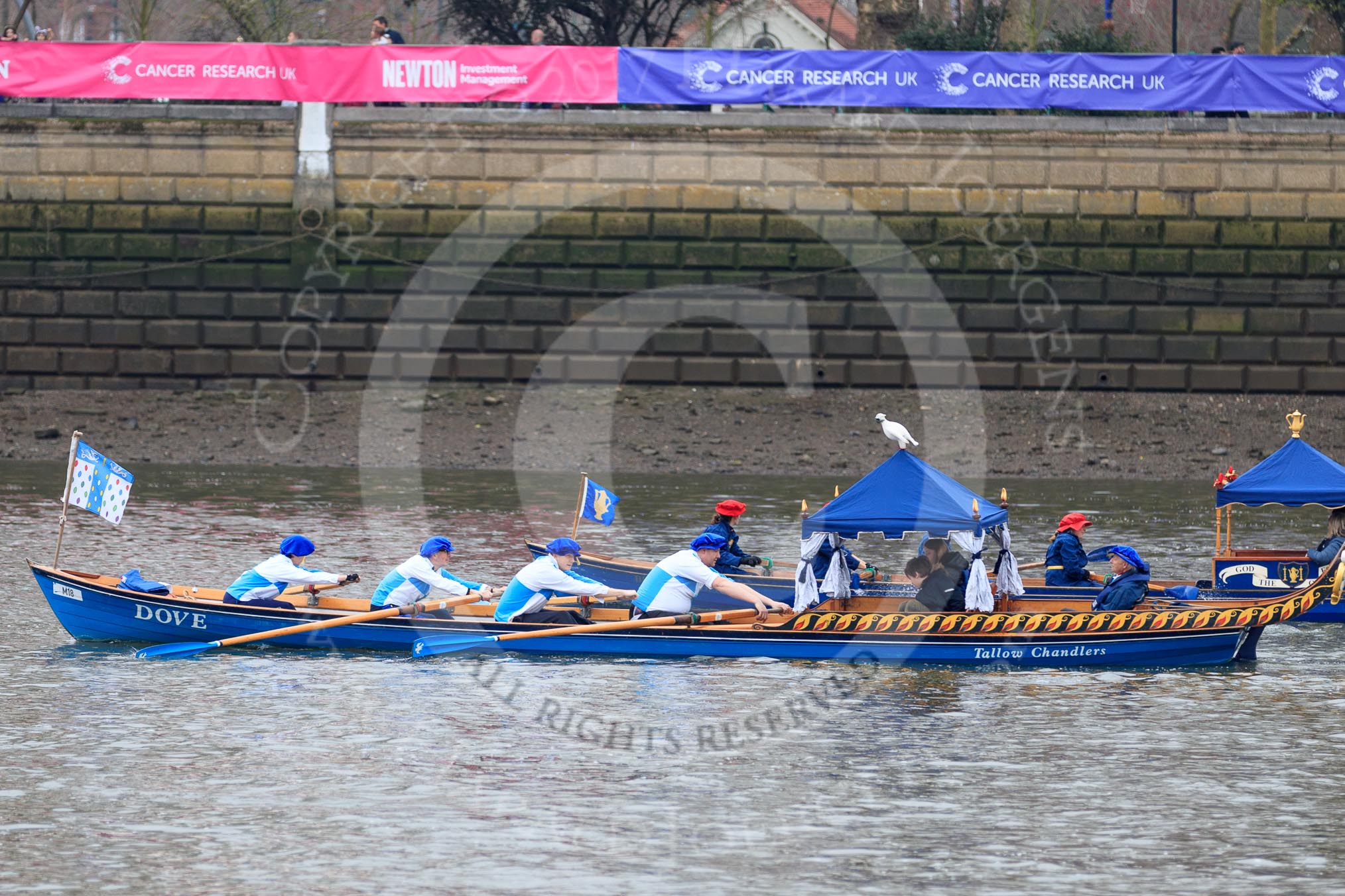 The Cancer Research UK Women's Boat Race 2018: Historic rowing boats (here "Dove", the Tallow Chandlers barge) entertaining the crowds.
River Thames between Putney Bridge and Mortlake,
London SW15,

United Kingdom,
on 24 March 2018 at 15:17, image #81