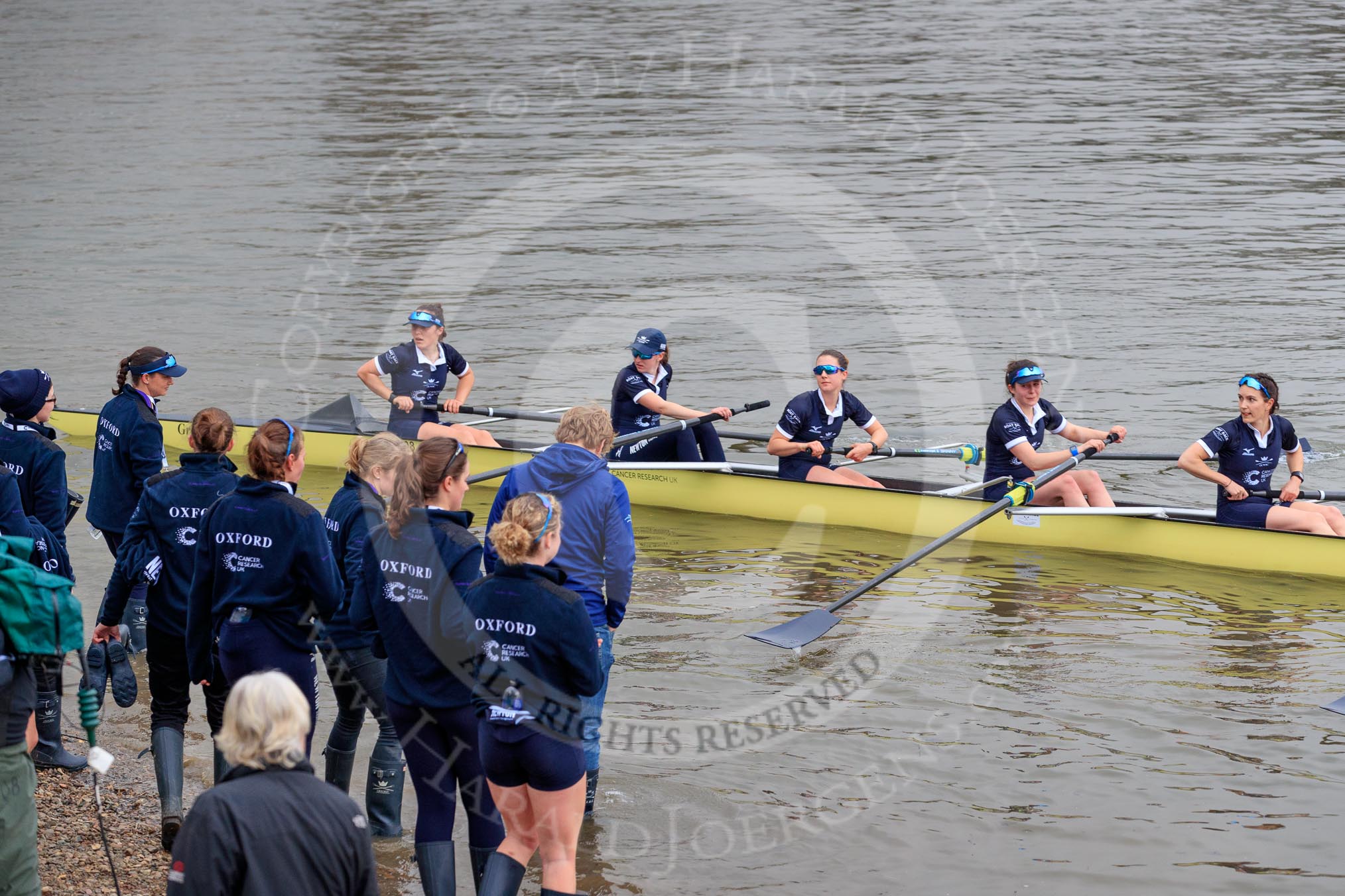 The Cancer Research UK Women's Boat Race 2018: The Oxford reserve boat, also beaten by Cambridge, arrives at Mortlake Boat Club - here bow Matlida Edwards, 2 Laura Depner, 3 Madeline Goss, 4 Rachel Anderson, and 5 Sarah Payne Riches.
River Thames between Putney Bridge and Mortlake,
London SW15,

United Kingdom,
on 24 March 2018 at 17:11, image #309