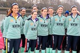 The Cancer Research UK Women's Boat Race 2018: The Cambridge crew  at the toss - president Daphne Martschenko (rowing in the reserve boat), cox Sophie Shapter, 6 Alice White, 7 Myriam Goudet-Boukhatmi, and in the second row 2 seat Imogen Grant, 3 Kelsey Barolak, 4 Thea Zabell, and 5 Paula Wesselmann. On the right race umpire Sir Matthew Pinsent..
River Thames between Putney Bridge and Mortlake,
London SW15,

United Kingdom,
on 24 March 2018 at 14:41, image #50