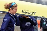 The Cancer Research UK Women's Boat Race 2018: The Oxford women carrying their boat from the boathouse to the river. here 5 seat Morgan McGovern.
River Thames between Putney Bridge and Mortlake,
London SW15,

United Kingdom,
on 24 March 2018 at 15:42, image #94
