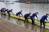 The Cancer Research UK Women's Boat Race 2018: The Oxford Blue Boat crew getting their boat on the river.
River Thames between Putney Bridge and Mortlake,
London SW15,

United Kingdom,
on 24 March 2018 at 15:43, image #98