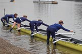 The Cancer Research UK Women's Boat Race 2018: The Oxford Blue Boat crew getting their boat ready for the race, here stroke Beth Bridgman, 7 seat Abigail Killen, 6 Sara Kushma, and 5 Morgan McGovern.
River Thames between Putney Bridge and Mortlake,
London SW15,

United Kingdom,
on 24 March 2018 at 15:43, image #99