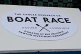 The Cancer Research UK Women's Boat Race 2018: The big sign at the podium for the Booat Race trophy presentation - "The Cancer Research UK Boat Race".
River Thames between Putney Bridge and Mortlake,
London SW15,

United Kingdom,
on 24 March 2018 at 17:05, image #235