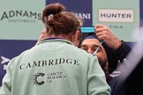 The Cancer Research UK Women's Boat Race 2018: Sir Harpal Kumar, CEO of Cancer Research UK. puts a Boat Race medal around the neck of Cambridge bow Tricia Smith.
River Thames between Putney Bridge and Mortlake,
London SW15,

United Kingdom,
on 24 March 2018 at 17:06, image #250