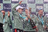 The Cancer Research UK Women's Boat Race 2018: The Cambridge women celebrating with their Boat Race medals, the Women's Boat Race trophy, and lots of Chapel Down Brut..
River Thames between Putney Bridge and Mortlake,
London SW15,

United Kingdom,
on 24 March 2018 at 17:09, image #280
