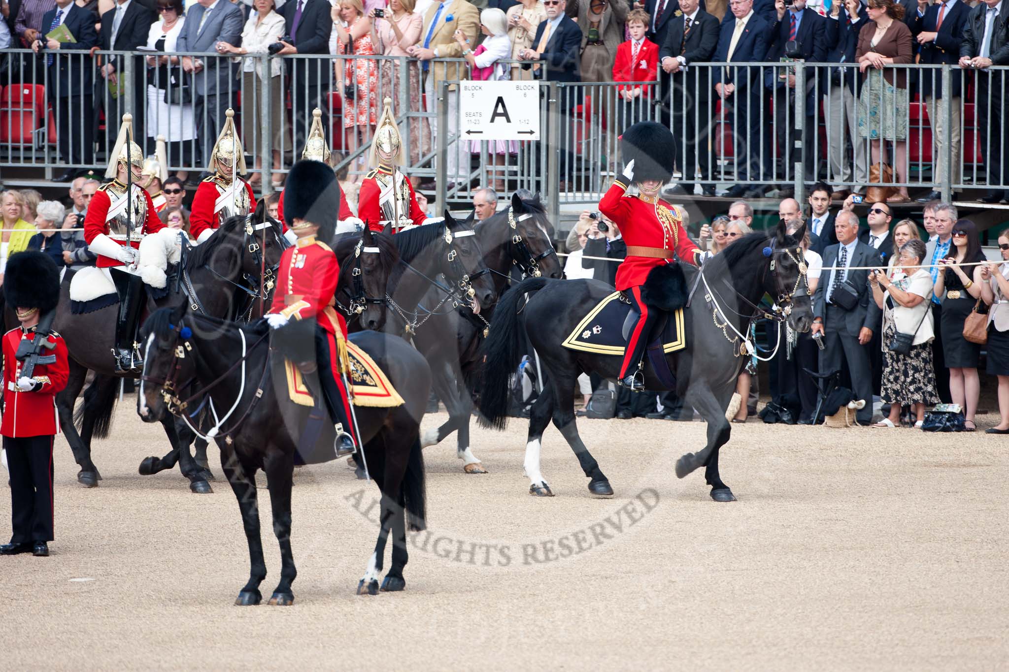 Trooping the Colour 2009: Leading the Royal Procession, the Brigade Major Household Division, Lieutenant Colonel Jeremy Bagshaw, followed by four Troopers of The Life Guards, arrives on Horse Guards Parade, here passing the Adjutant of the Parade, with the Brigade Major saluting the Colour..
Horse Guards Parade, Westminster,
London SW1,

United Kingdom,
on 13 June 2009 at 10:55, image #108