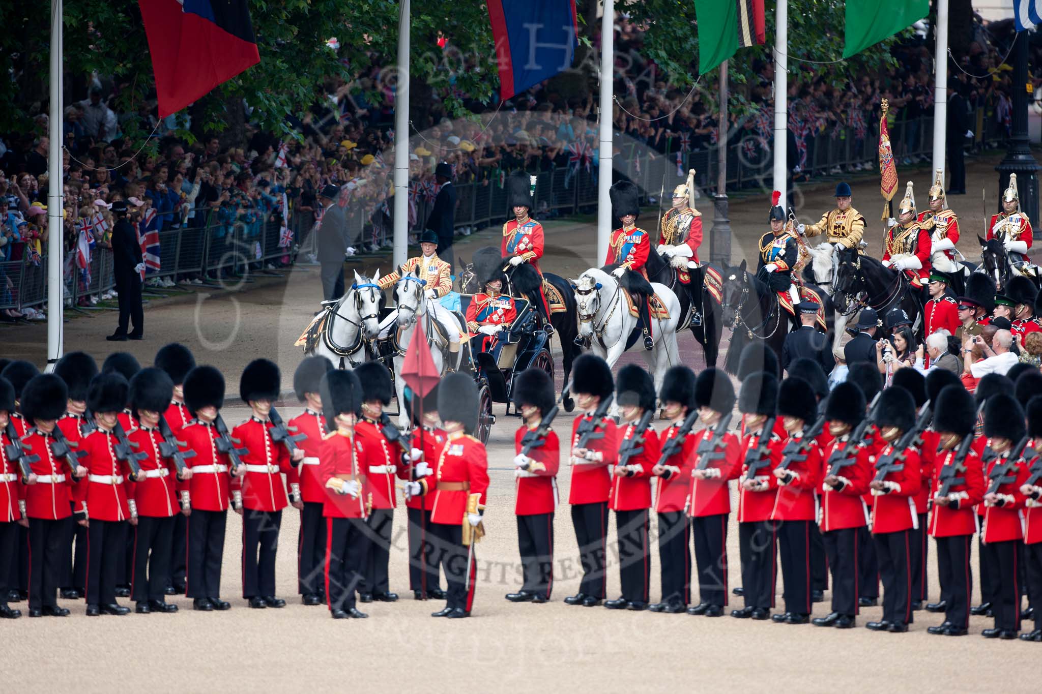 Trooping the Colour 2009: The Royal Procession arriving on Horse Guards Parade. Behind the ivory mounted phaeton, carrying HM The Queen and HRH The Duke of Edinburg, are the Royal Colonels, Field Officer, Escort Commander, Trumpeter, Standard Bearer and Standard Coverer..
Horse Guards Parade, Westminster,
London SW1,

United Kingdom,
on 13 June 2009 at 10:56, image #117