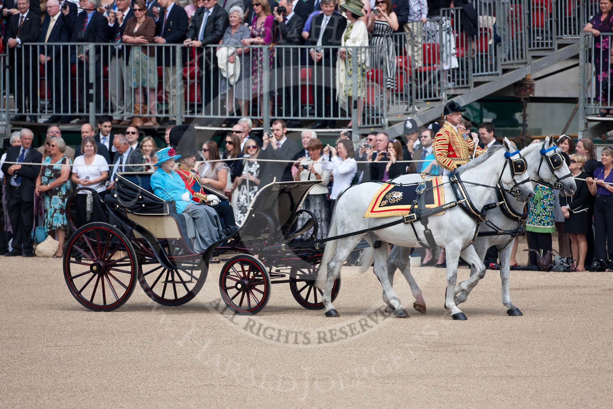 Trooping the Colour 2009: The ivory mounted phaeton with HM The Queen and HRH The Duke of Edinburgh on horse guards parade, riding one of the the Windsor Grey horses head coachman Jack Hargreaves..
Horse Guards Parade, Westminster,
London SW1,

United Kingdom,
on 13 June 2009 at 10:57, image #120