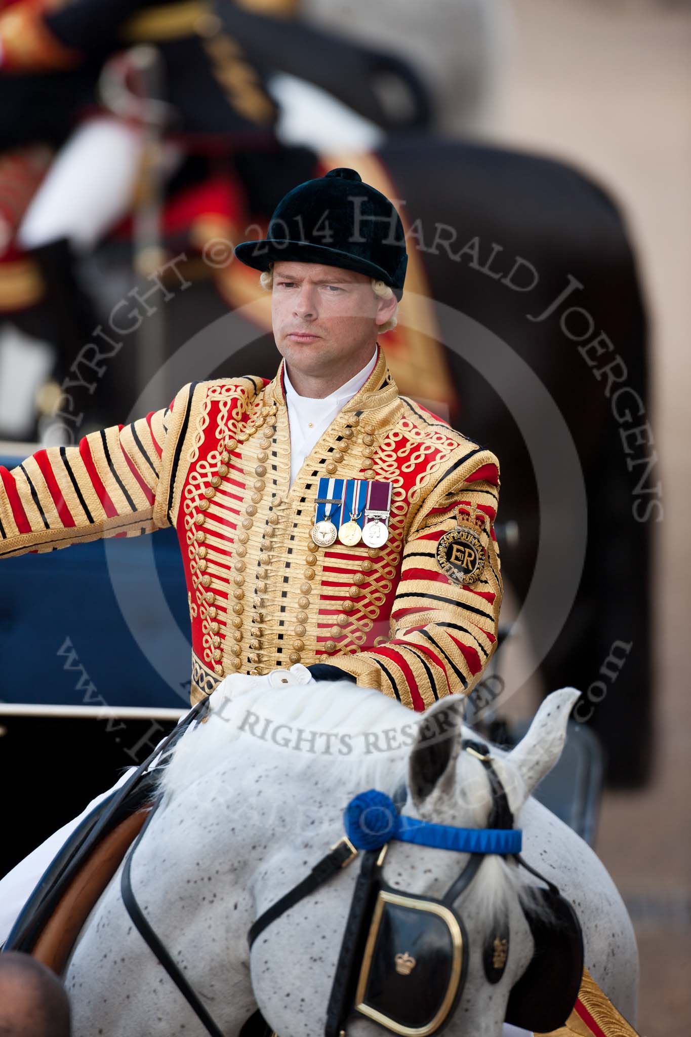 Trooping the Colour 2009: Close-up of the head coachman, Jack Hargreaves, riding one of the Windsor Grey horses, ready to take HM The Queen onto the Inspection of the Line..
Horse Guards Parade, Westminster,
London SW1,

United Kingdom,
on 13 June 2009 at 10:59, image #130