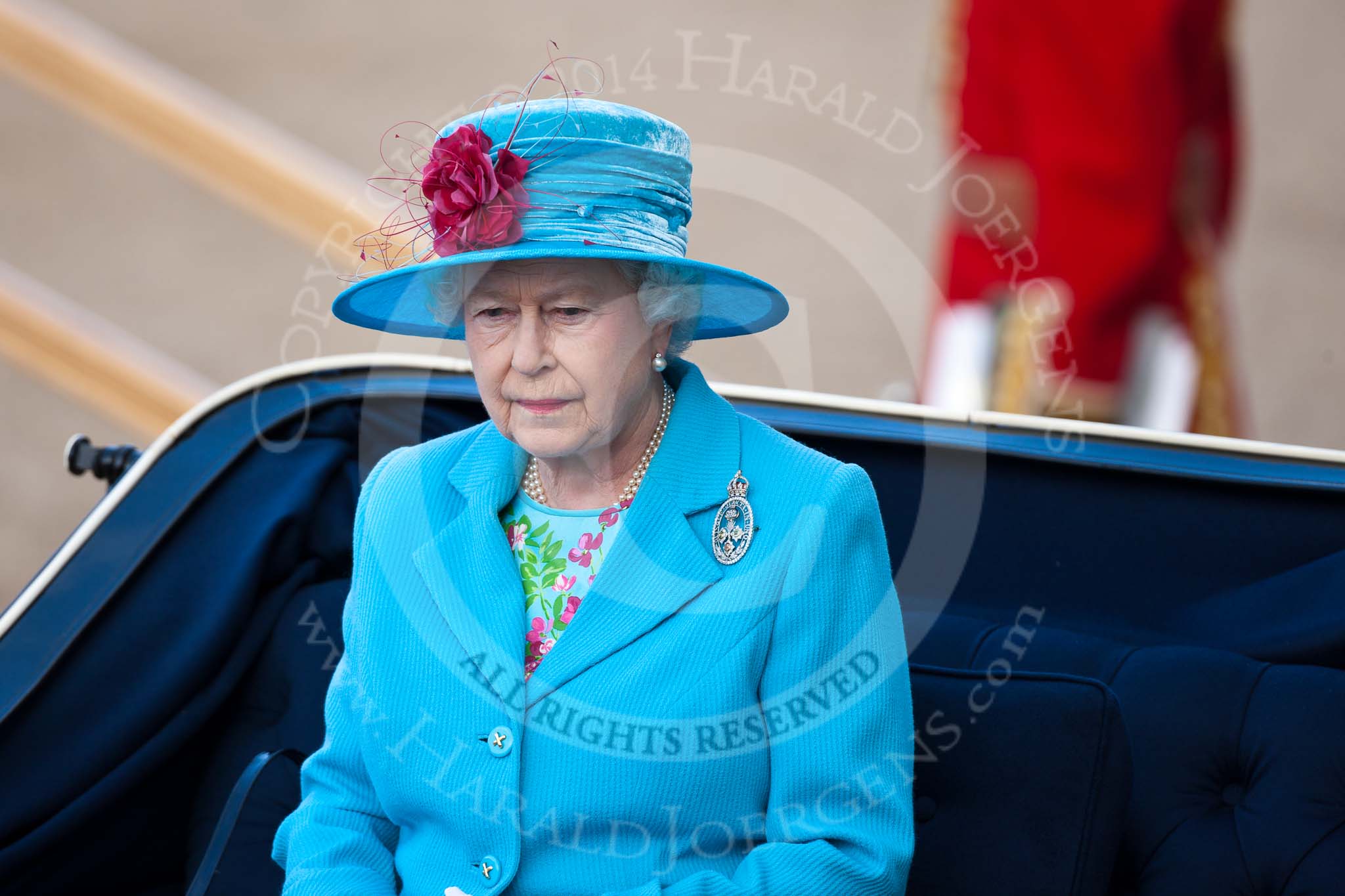 Trooping the Colour 2009: Close-up of HM The Queen in the ivory mounted phaeton during the Inspection of the Line. She is wearing a brooch of the Irish Guards..
Horse Guards Parade, Westminster,
London SW1,

United Kingdom,
on 13 June 2009 at 11:00, image #134