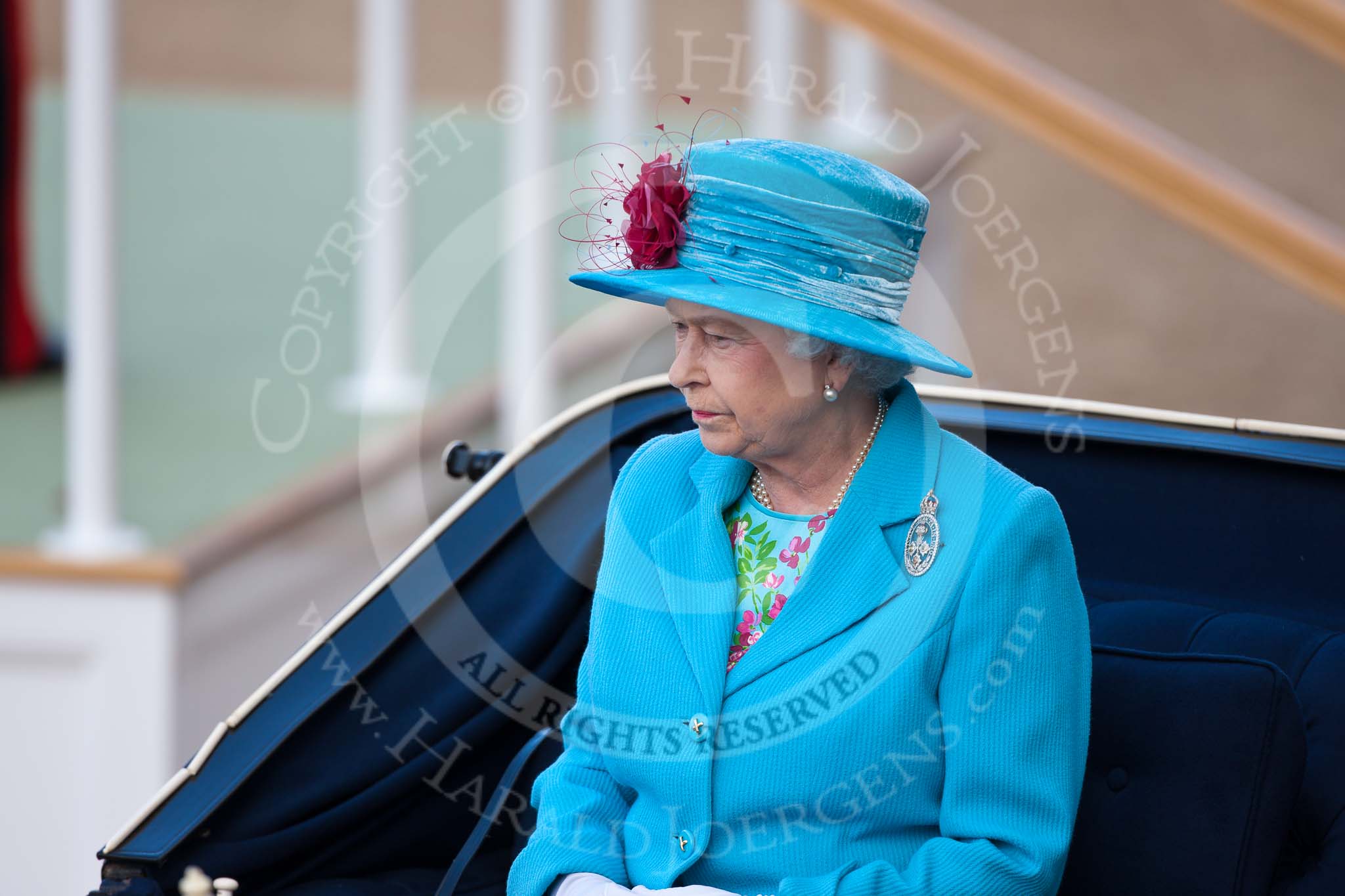 Trooping the Colour 2009: Close-up of HM The Queen in the ivory mounted phaeton during the Inspection of the Line. She is wearing a brooch of the Irish Guards..
Horse Guards Parade, Westminster,
London SW1,

United Kingdom,
on 13 June 2009 at 11:00, image #135