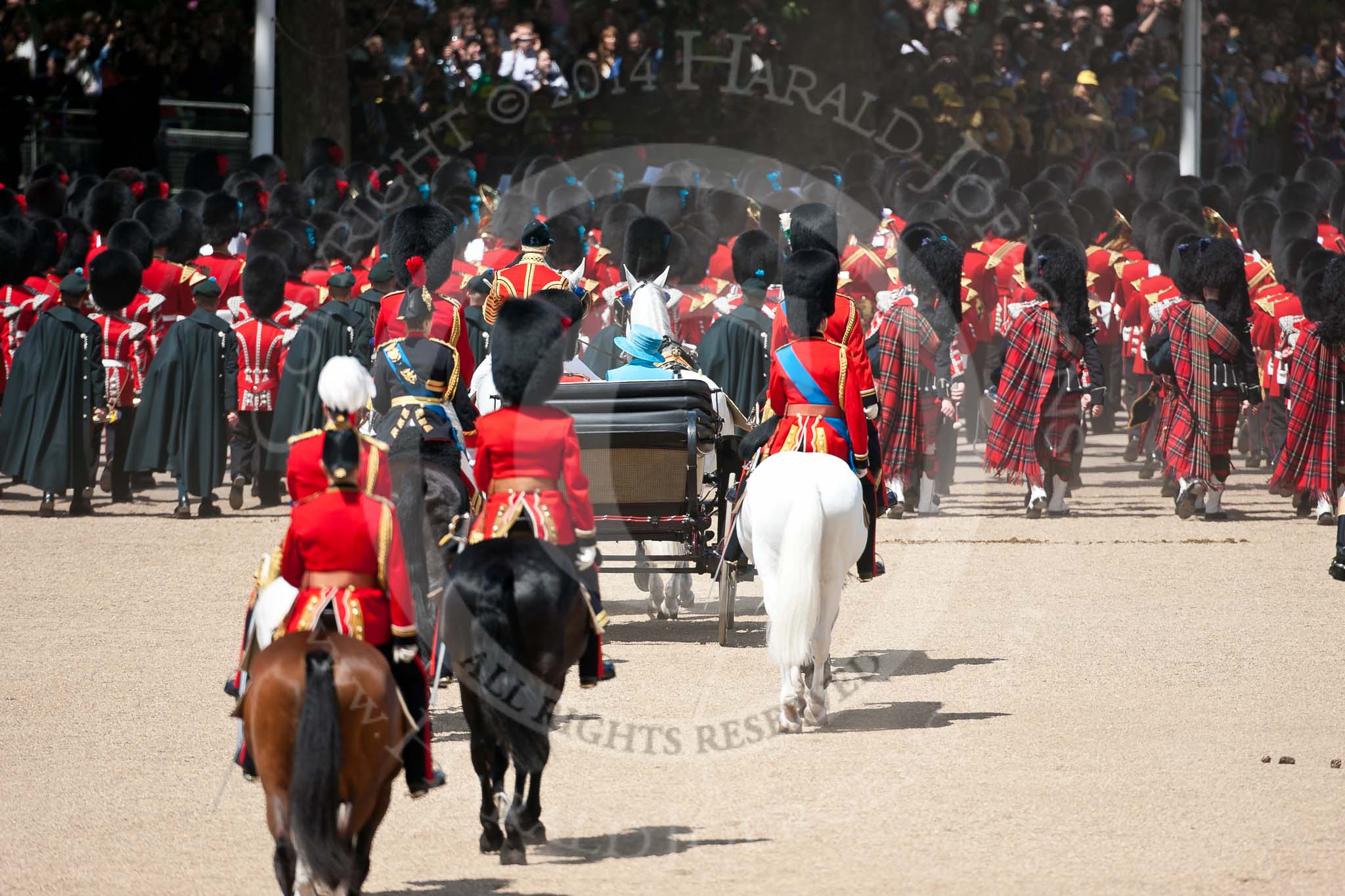 Trooping the Colour 2009: March Off - the footguards are followed by the Massed Bands, with the drummers in the rear, and the pipers in the last row - on the left the Irish Pipers, on the right the Scots Pipers. Behind, the ivory mounted phaeton carrying Her Majesty..
Horse Guards Parade, Westminster,
London SW1,

United Kingdom,
on 13 June 2009 at 12:13, image #264