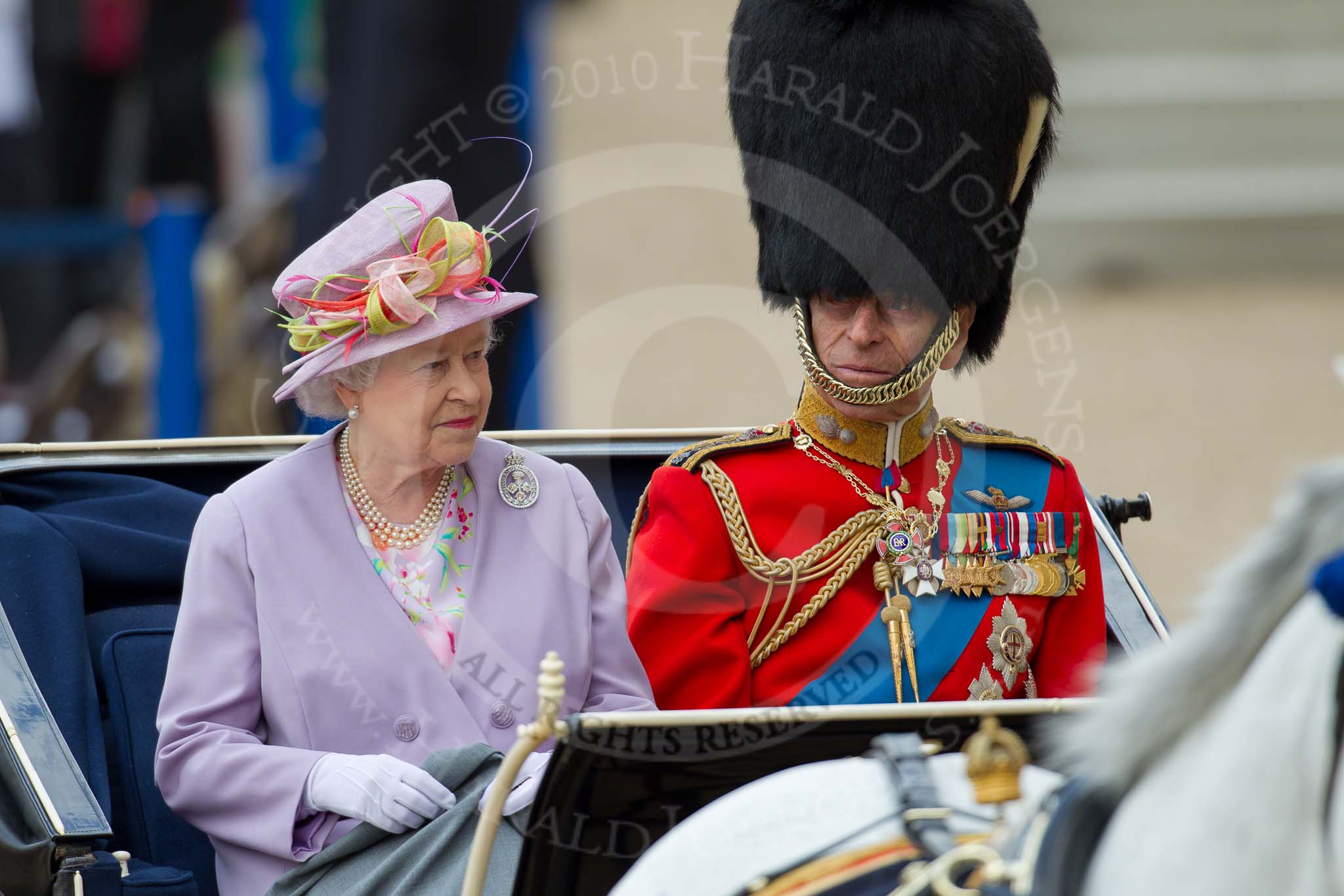 Trooping the Colour 2010: Queen Elizabeth II and The Prince Philip leading the Royal Procession onto Horse Guards Parade. 

In 58 years, The Queen has attended every single parade, except 1955, when there was a national rail strike.

The Royal carriage, called the &quot;Ivory Mounted Phaeton&quot;, had been built for Queen Victoria in 1842..
Horse Guards Parade, Westminster,
London SW1,
Greater London,
United Kingdom,
on 12 June 2010 at 10:59, image #63