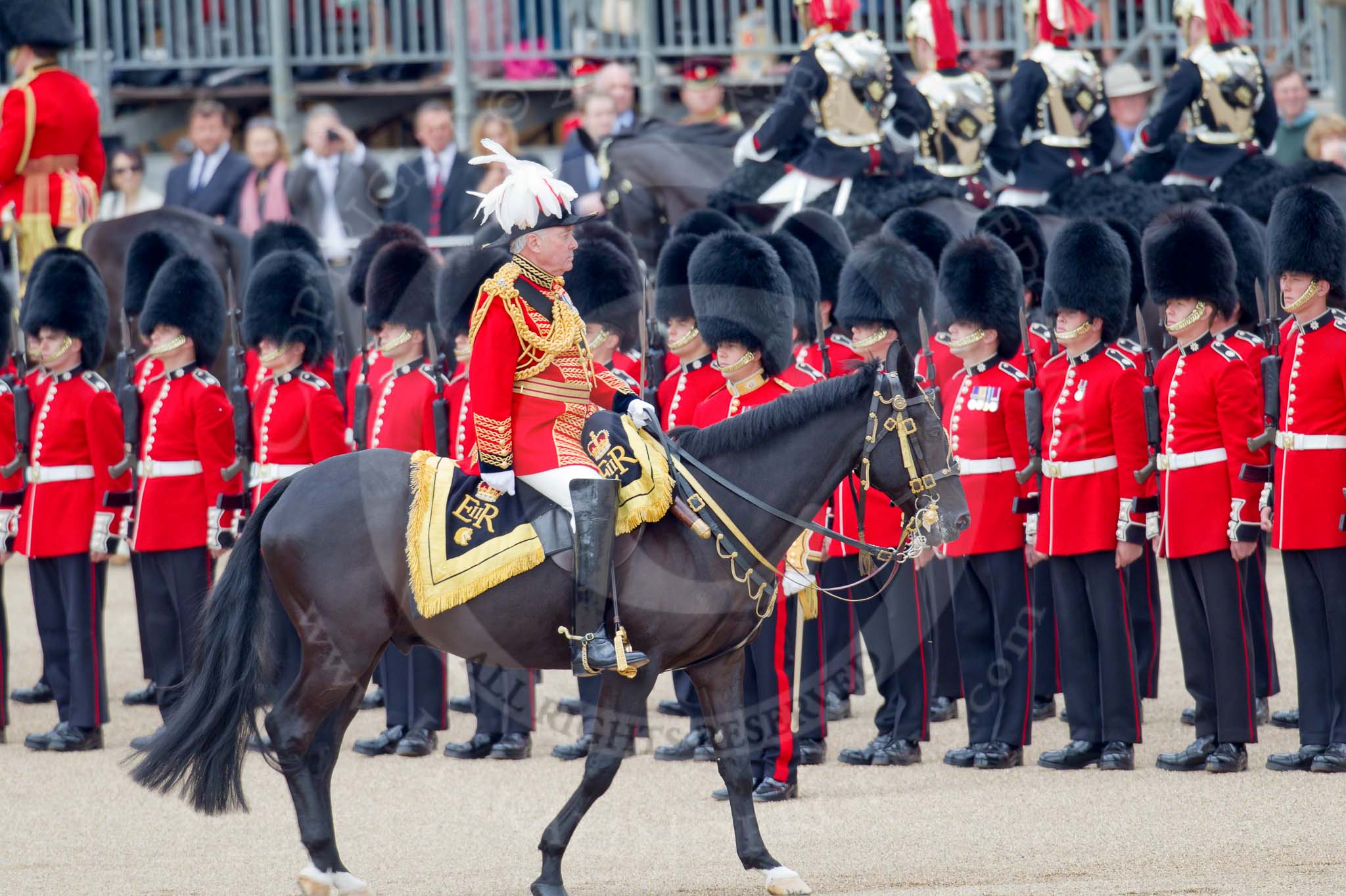 Trooping the Colour 2010: Master of the Horse - The Lord Vestey. Samuel George Armstrong Vestey, the third Baron Vestey, is the Master of the Horse of the Royal Household. He, born 1941, is a British businessman (Vestey Group) and former politician.

In the photo, taken during the Inspection ofthe Line, he is passing No. 6 Guard, No. 7 Company Coldstream Guards, on the eastern side of Horse Guards Parade..
Horse Guards Parade, Westminster,
London SW1,
Greater London,
United Kingdom,
on 12 June 2010 at 11:04, image #85