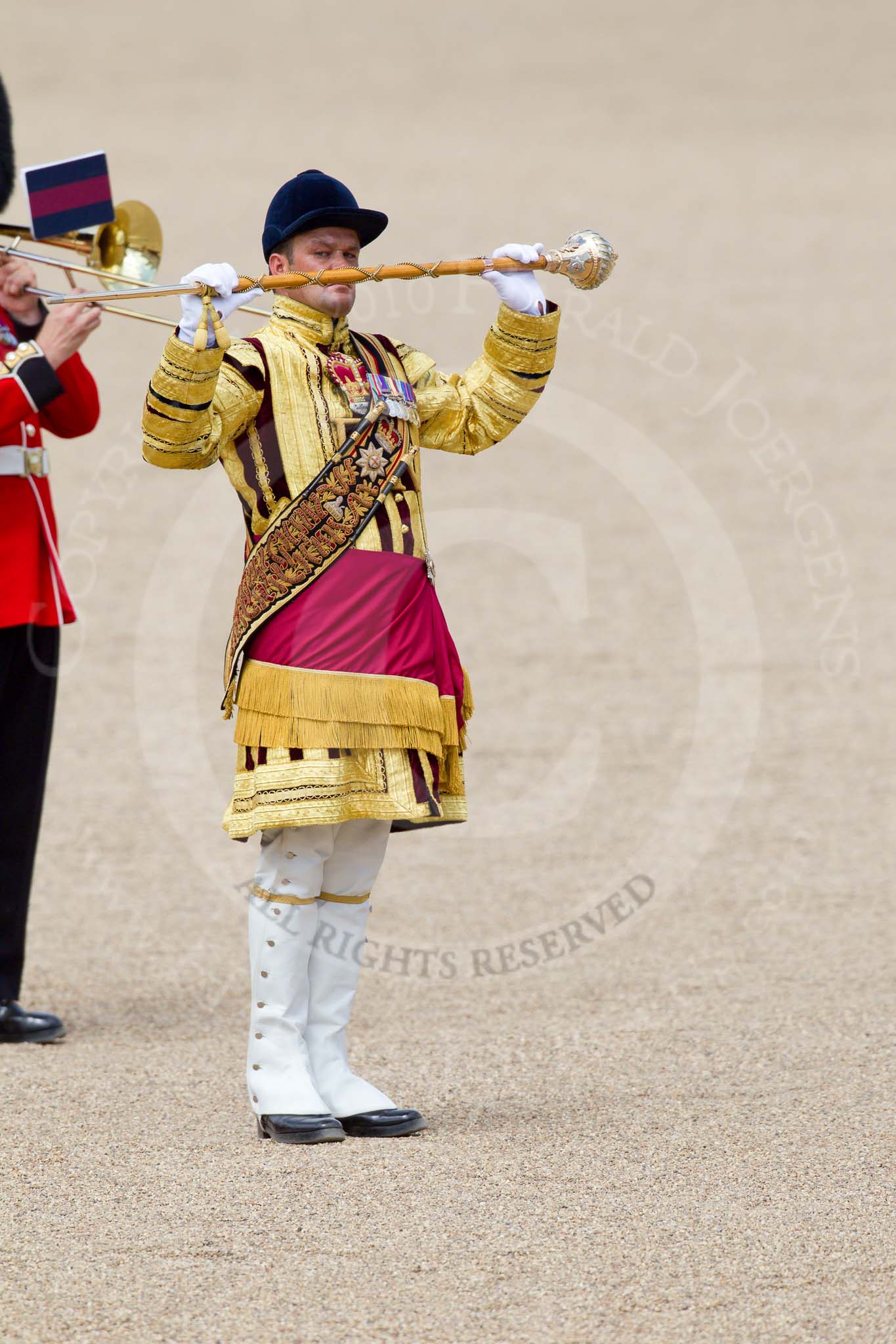 Trooping the Colour 2010: Drum Majors and their bands playing during the March Past by the Foot Guards..
Horse Guards Parade, Westminster,
London SW1,
Greater London,
United Kingdom,
on 12 June 2010 at 11:40, image #150