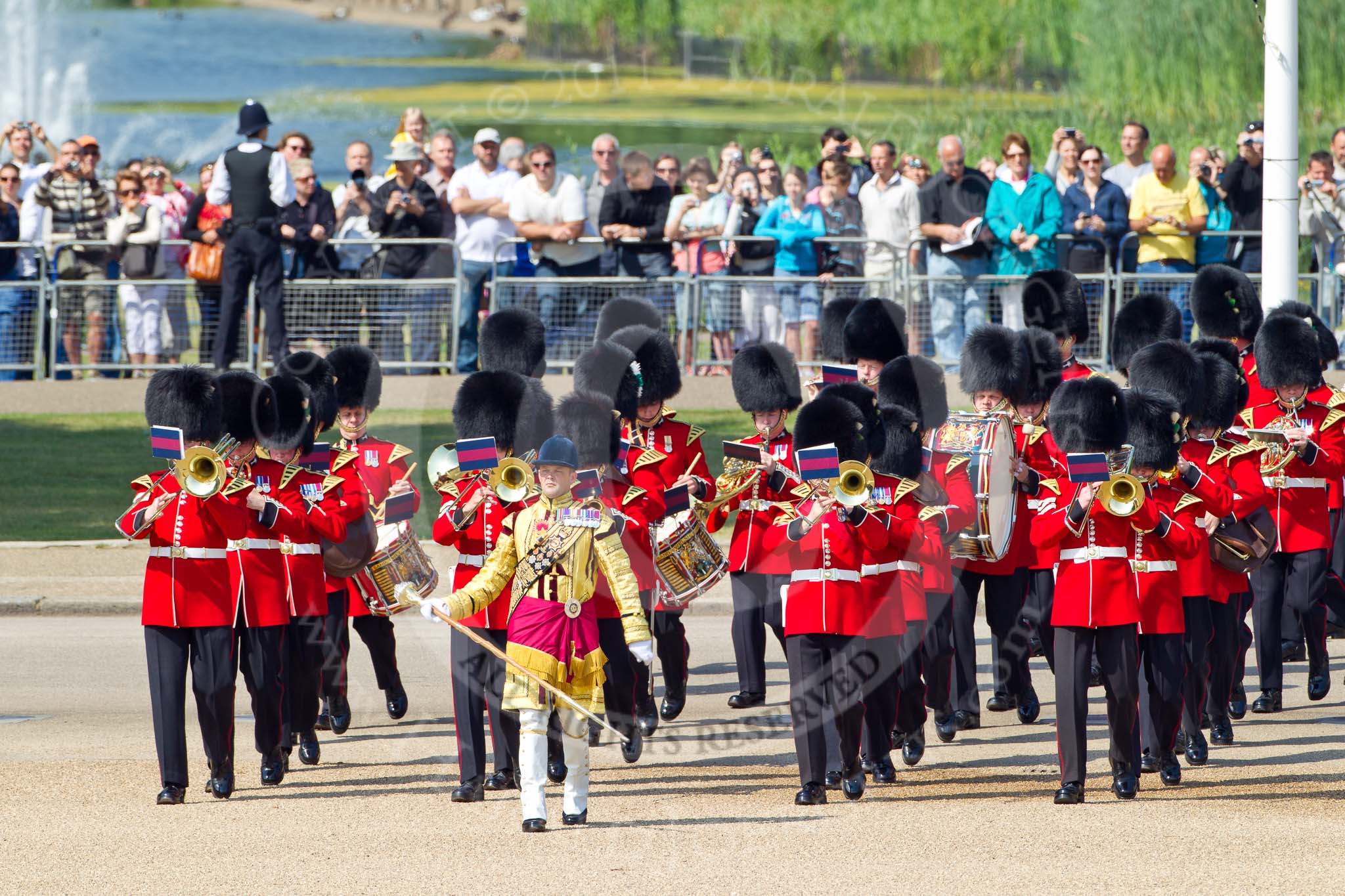 The Colonel's Review 2011: Senior Drum Major Ben Roberts leading the Band of the Welsh Guards onto Horse Guards Parade. In the background spectators watching from St. James's Park..
Horse Guards Parade, Westminster,
London SW1,

United Kingdom,
on 04 June 2011 at 10:12, image #10