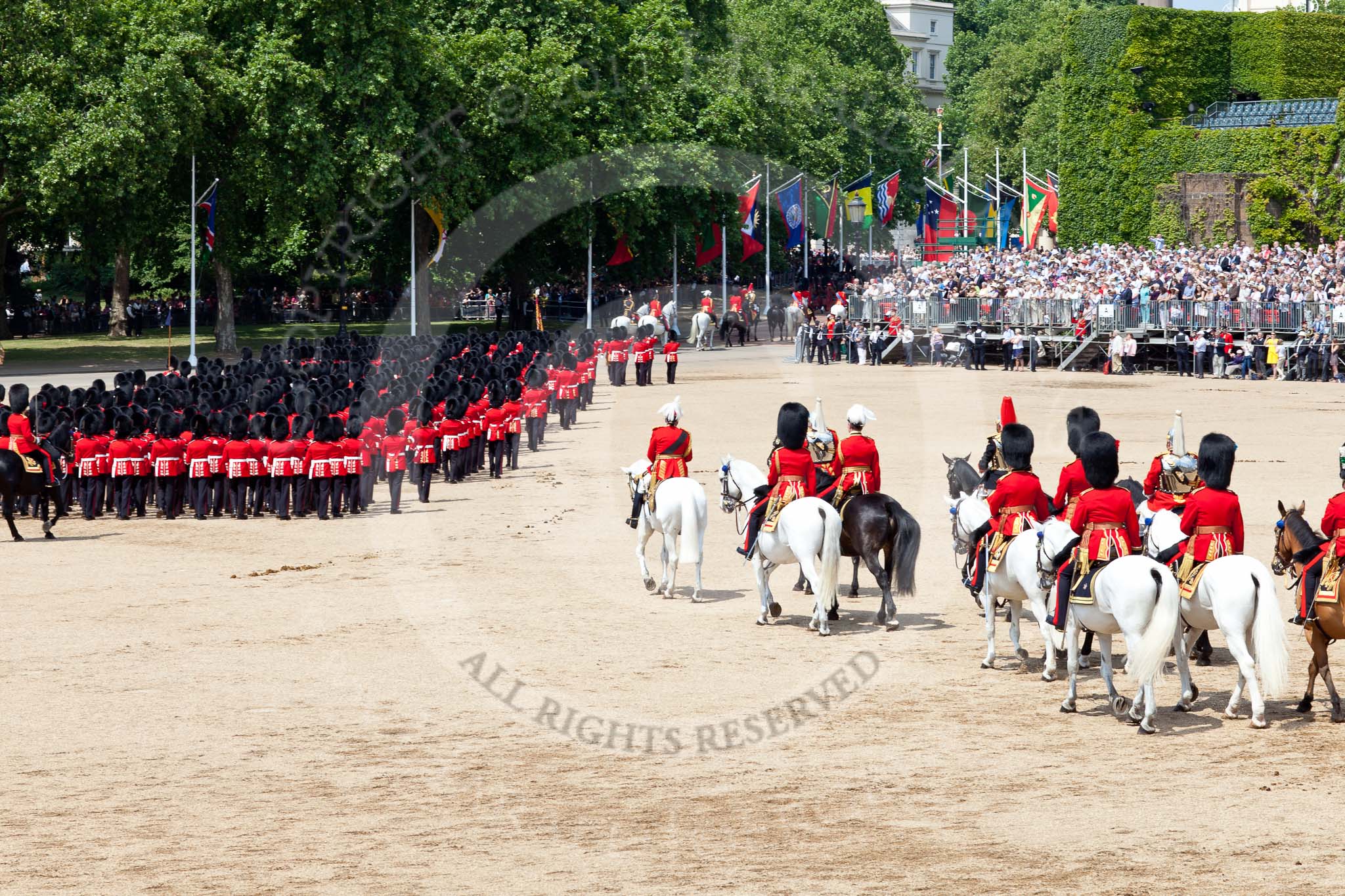 The Colonel's Review 2011: Marching Off - the guards leaving Horse Guards Parade, marching towards The Mall, followed by the Royal Procession, with the four Troopers of The Life Guards and the four Troopers of the Blues and Royals at the end..
Horse Guards Parade, Westminster,
London SW1,

United Kingdom,
on 04 June 2011 at 12:09, image #299