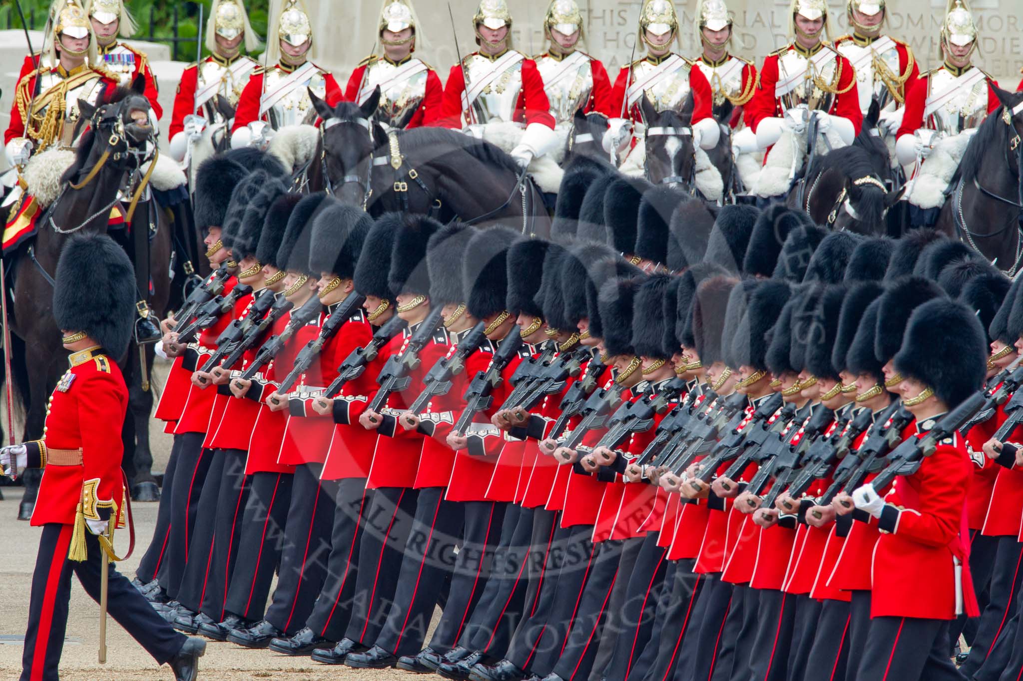 Trooping the Colour 2011: The March Past by the Foot Guards in slow time. Here the Escort to the Colour, No. 2 Guard, B Company Scots Guards, lead my Major H R S Clarke..
Horse Guards Parade, Westminster,
London SW1,
Greater London,
United Kingdom,
on 11 June 2011 at 11:32, image #221