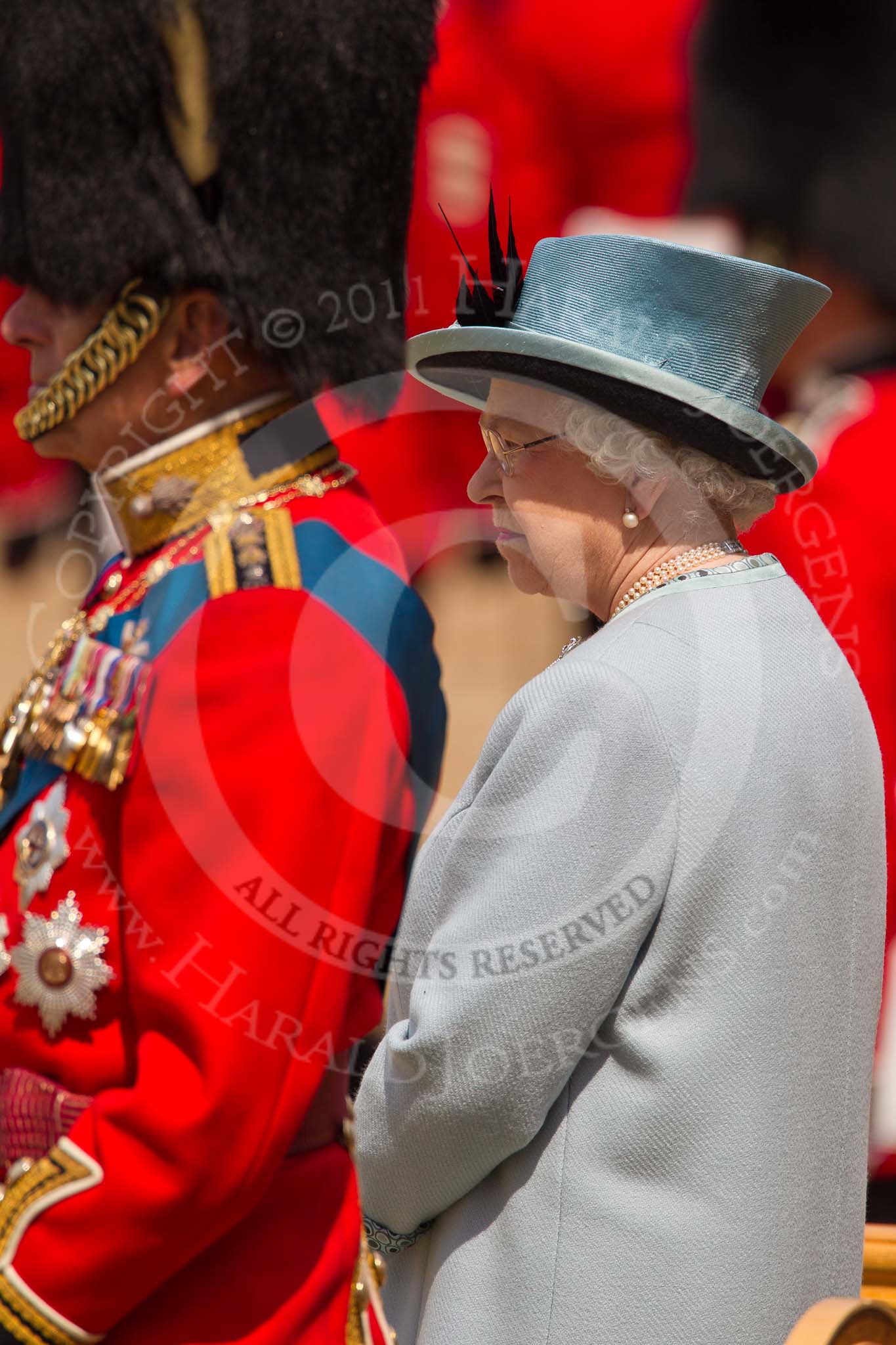 Trooping the Colour 2011: HRH Prince Philip, The Duke of Edinburg, with HM The Queen on the saluting stand, watching the parade..
Horse Guards Parade, Westminster,
London SW1,
Greater London,
United Kingdom,
on 11 June 2011 at 11:39, image #252