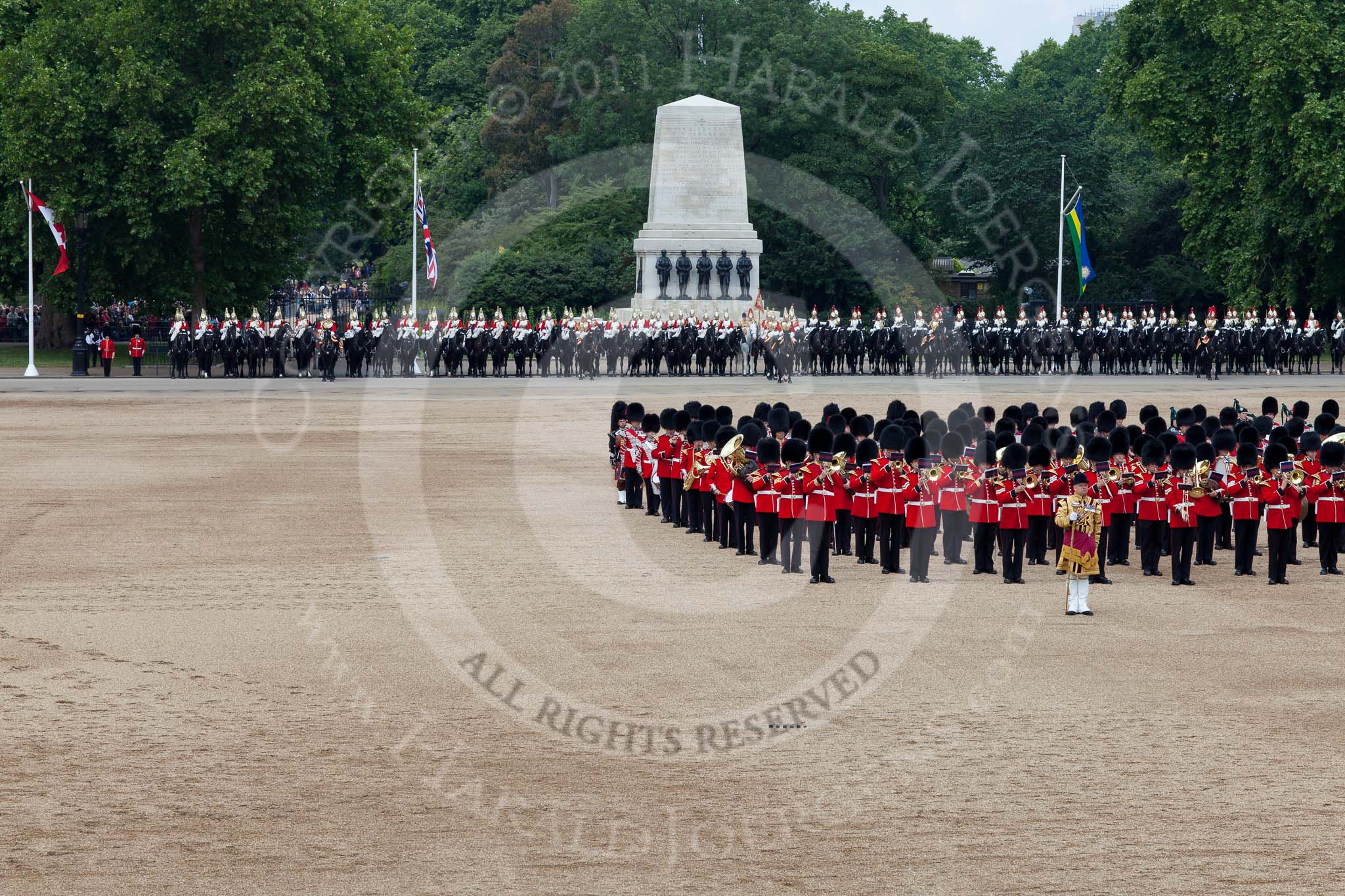 Trooping the Colour 2011: During the The March Past. On the right, the Massed Bands playing.In the backgound The Life Guards, and The Blues and Royals, of the Household Cavalry..
Horse Guards Parade, Westminster,
London SW1,
Greater London,
United Kingdom,
on 11 June 2011 at 11:41, image #263