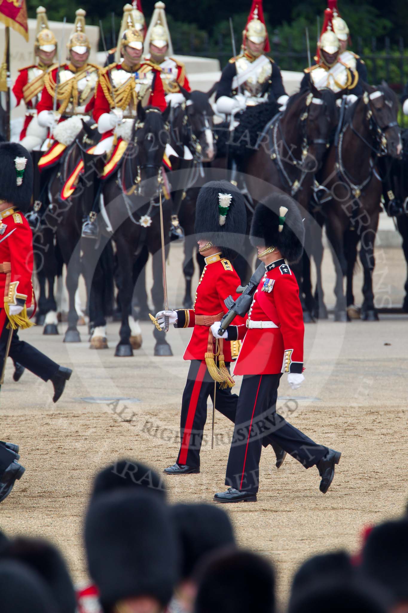 Trooping the Colour 2011: The Subaltern of No. 5 Guard 1st Battalion Welsh Guards, Lieutenant F J Wight, and the Wesh Guard's Ensign, following No. 5 Guard after the March Past in Slow Time..
Horse Guards Parade, Westminster,
London SW1,
Greater London,
United Kingdom,
on 11 June 2011 at 11:44, image #284