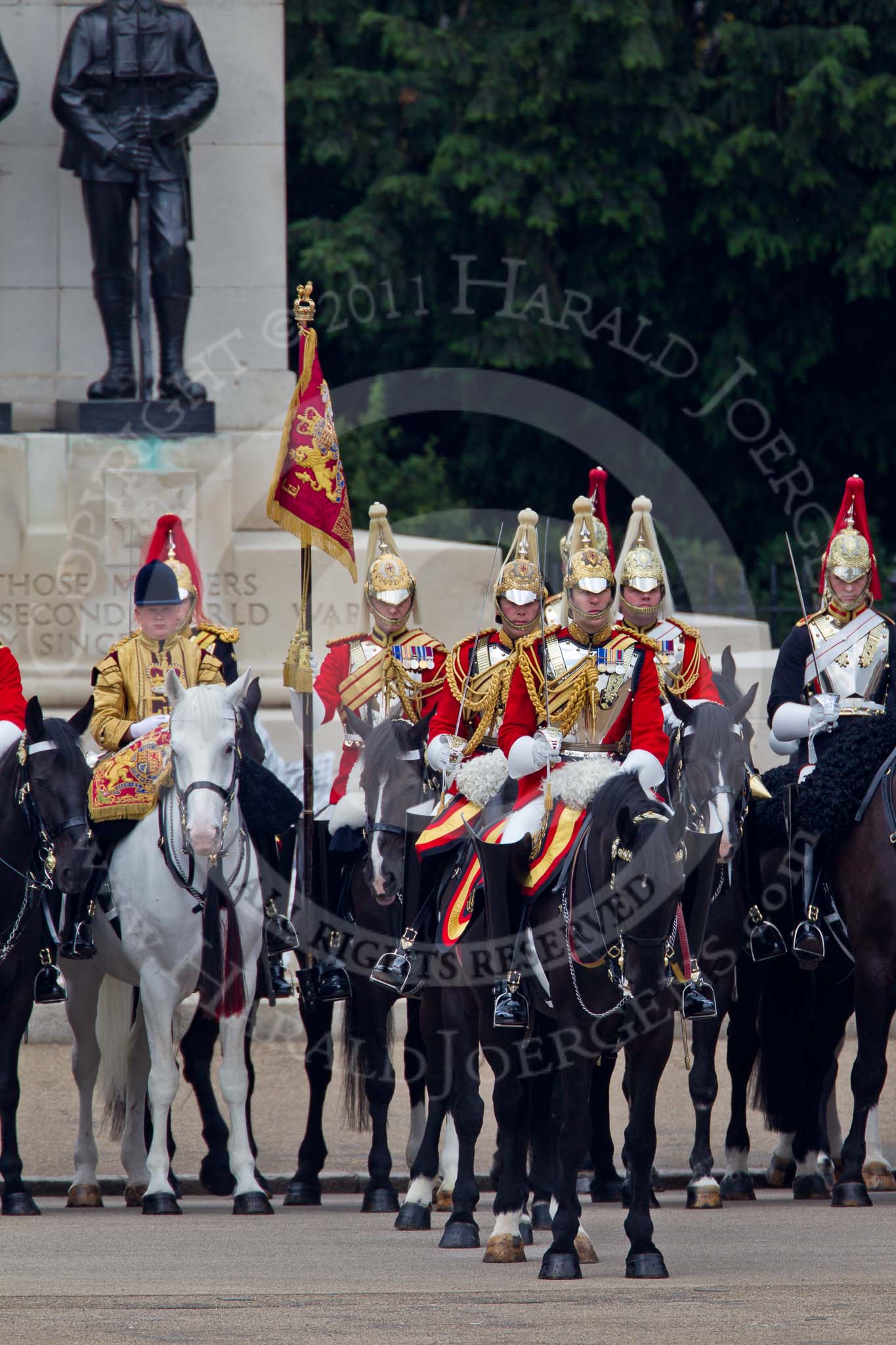 Trooping the Colour 2011: In front of the Guards Memorial, on the St. James's Park side of Horse Guards Parade, members of the Household Cavalry, on the white horse the Trumpeter, next to him the Standard Bearer..
Horse Guards Parade, Westminster,
London SW1,
Greater London,
United Kingdom,
on 11 June 2011 at 11:44, image #288