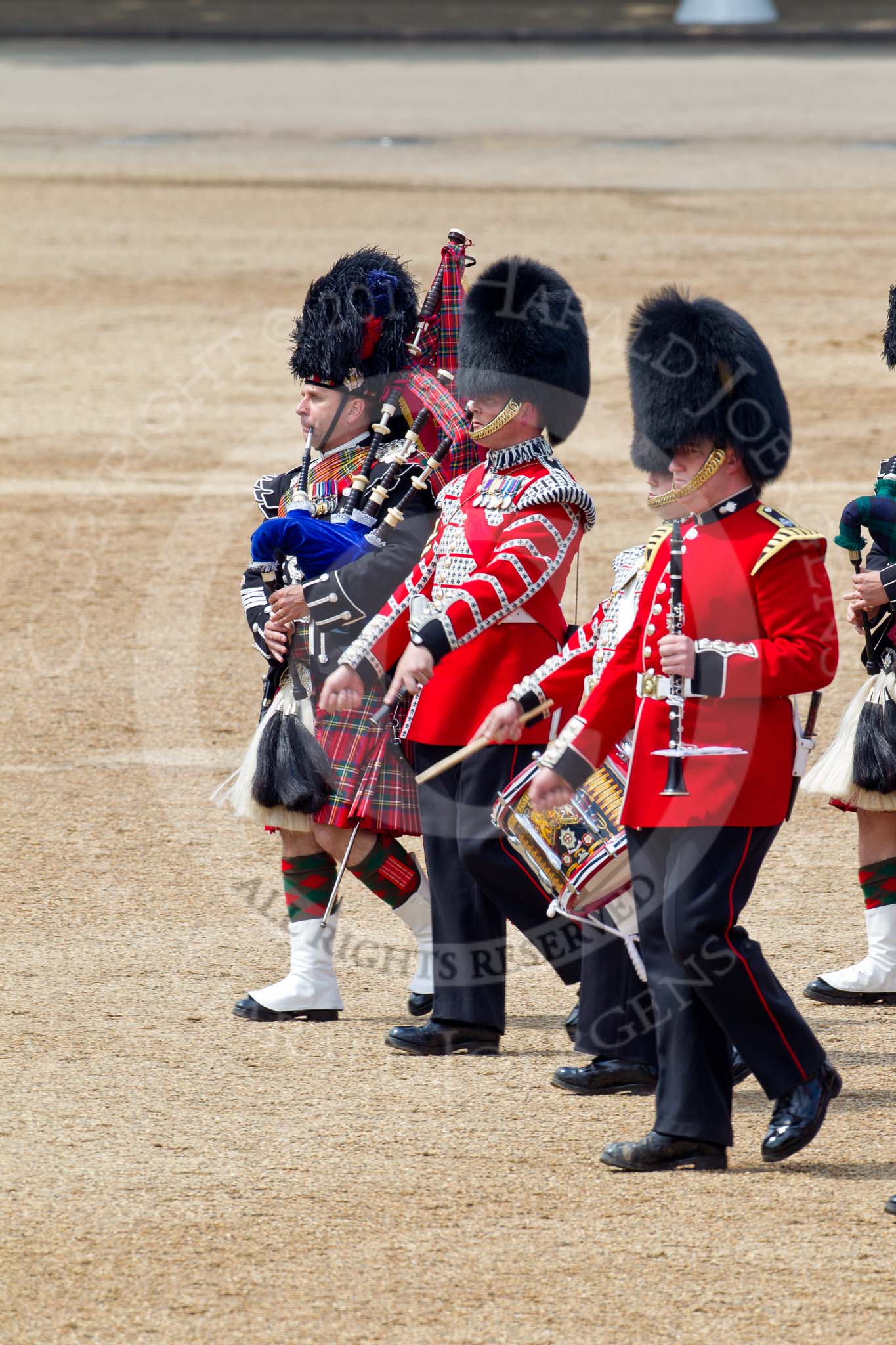 Trooping the Colour 2011: On the left, Pipe Major B Heriot, Scots Guards, with two drummers of the Scots Guards Band and a musicians of the Grenadier Guards..
Horse Guards Parade, Westminster,
London SW1,
Greater London,
United Kingdom,
on 11 June 2011 at 11:53, image #310