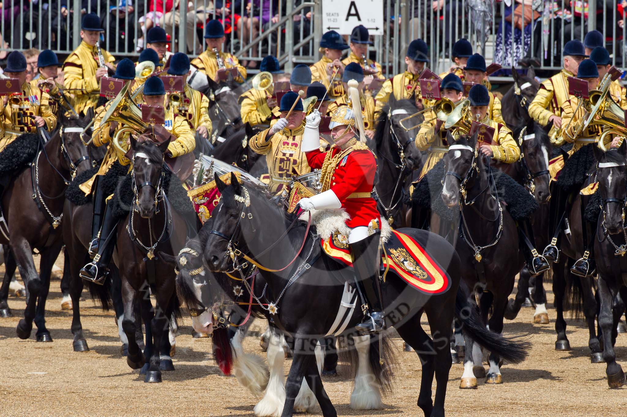 Trooping the Colour 2011: The Mounted Bands of the Household Cavalry moving onto the parade ground.   In red Major K L Davies, The Life Guards, Director of Music, on his right one of the two kettle drummers..
Horse Guards Parade, Westminster,
London SW1,
Greater London,
United Kingdom,
on 11 June 2011 at 11:53, image #316