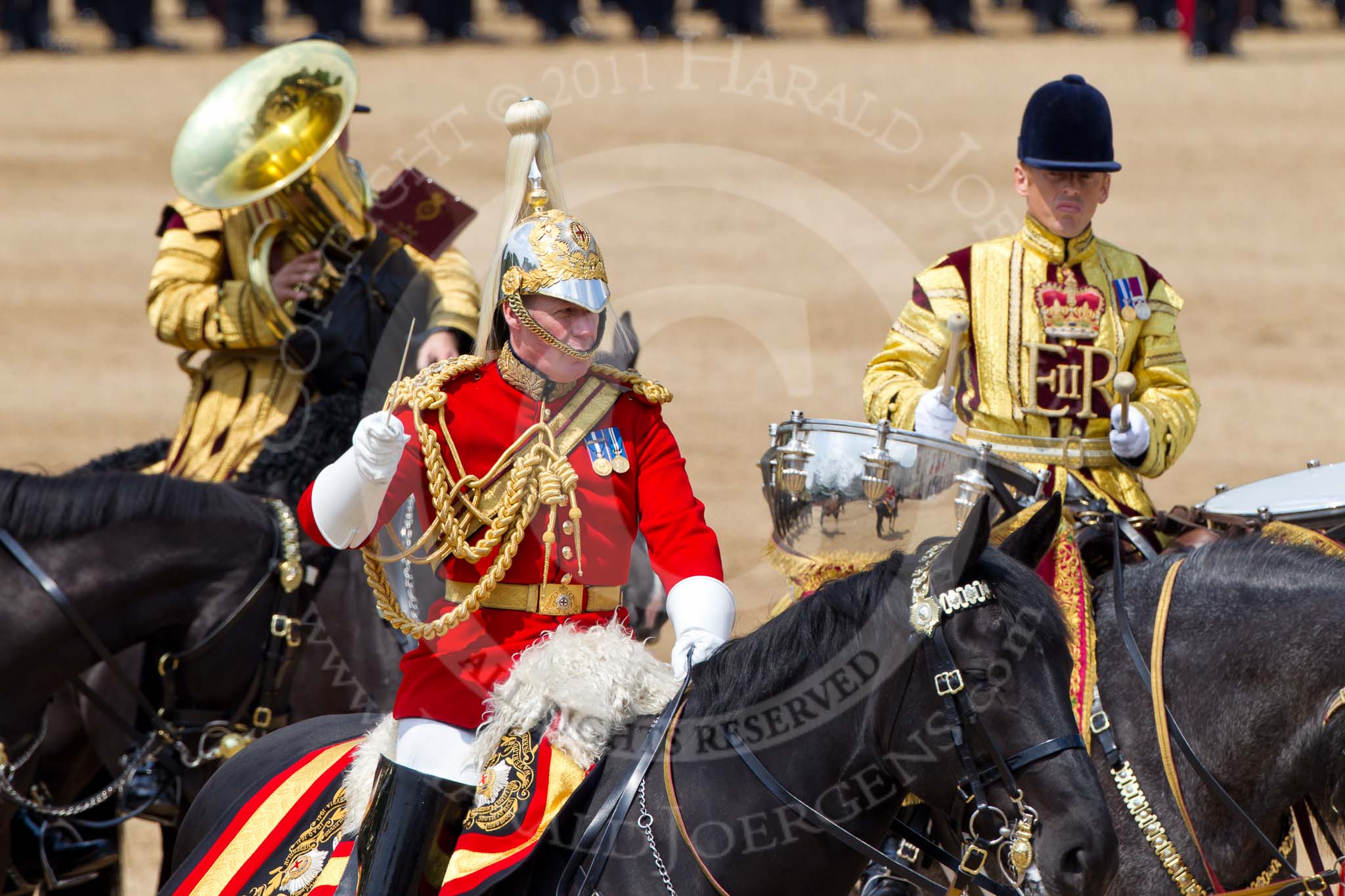 Trooping the Colour 2011: The Director of Music, Major K L Davies, The Life Guards, behind him one of the two kettle drummers..
Horse Guards Parade, Westminster,
London SW1,
Greater London,
United Kingdom,
on 11 June 2011 at 11:57, image #354